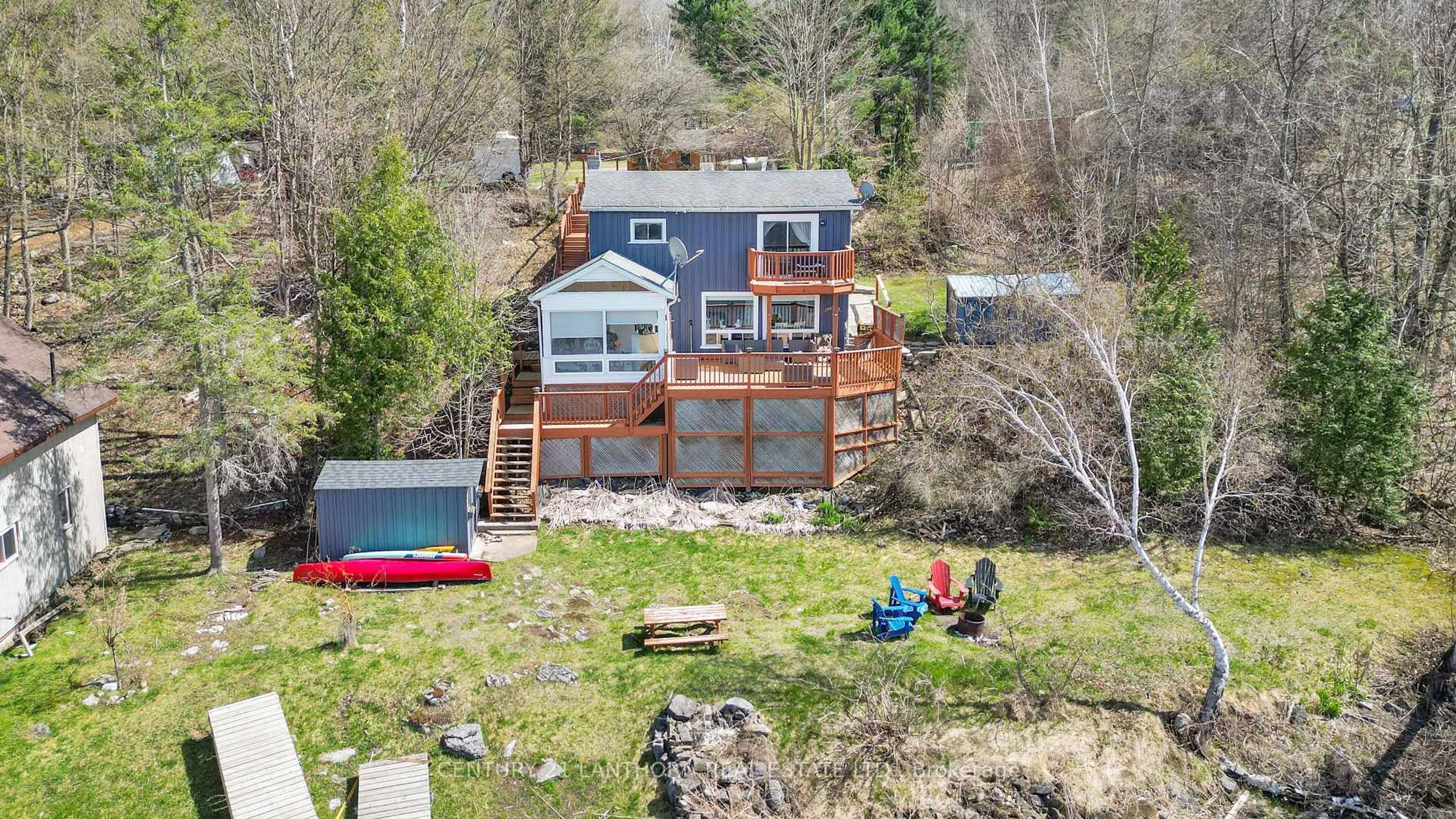 A pic from outside/outdoor area/front of a property/back of a property/a pic from drone, water/lake/river/ocean view for 177 Camp Lane, Tweed Ontario K0K 3J0