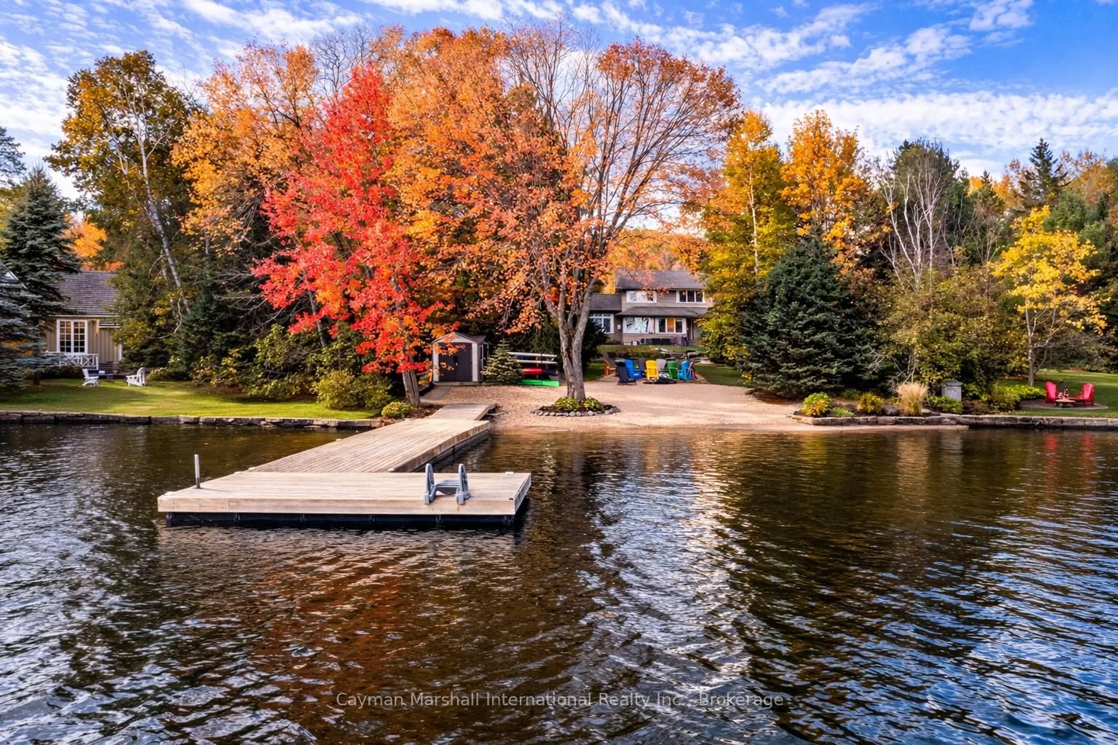 A pic from outside/outdoor area/front of a property/back of a property/a pic from drone, water/lake/river/ocean view for 1079 Sawmill Lane, Lake of Bays Ontario P1H 2J6