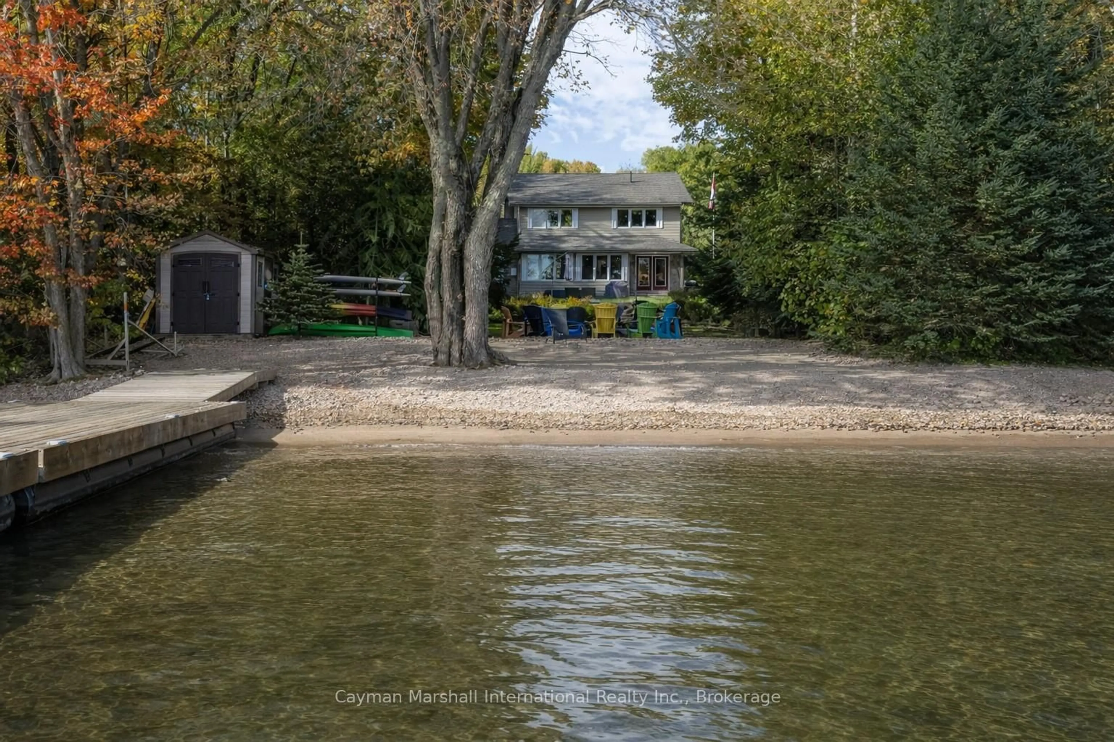 A pic from outside/outdoor area/front of a property/back of a property/a pic from drone, water/lake/river/ocean view for 1079 Sawmill Lane, Lake of Bays Ontario P1H 2J6