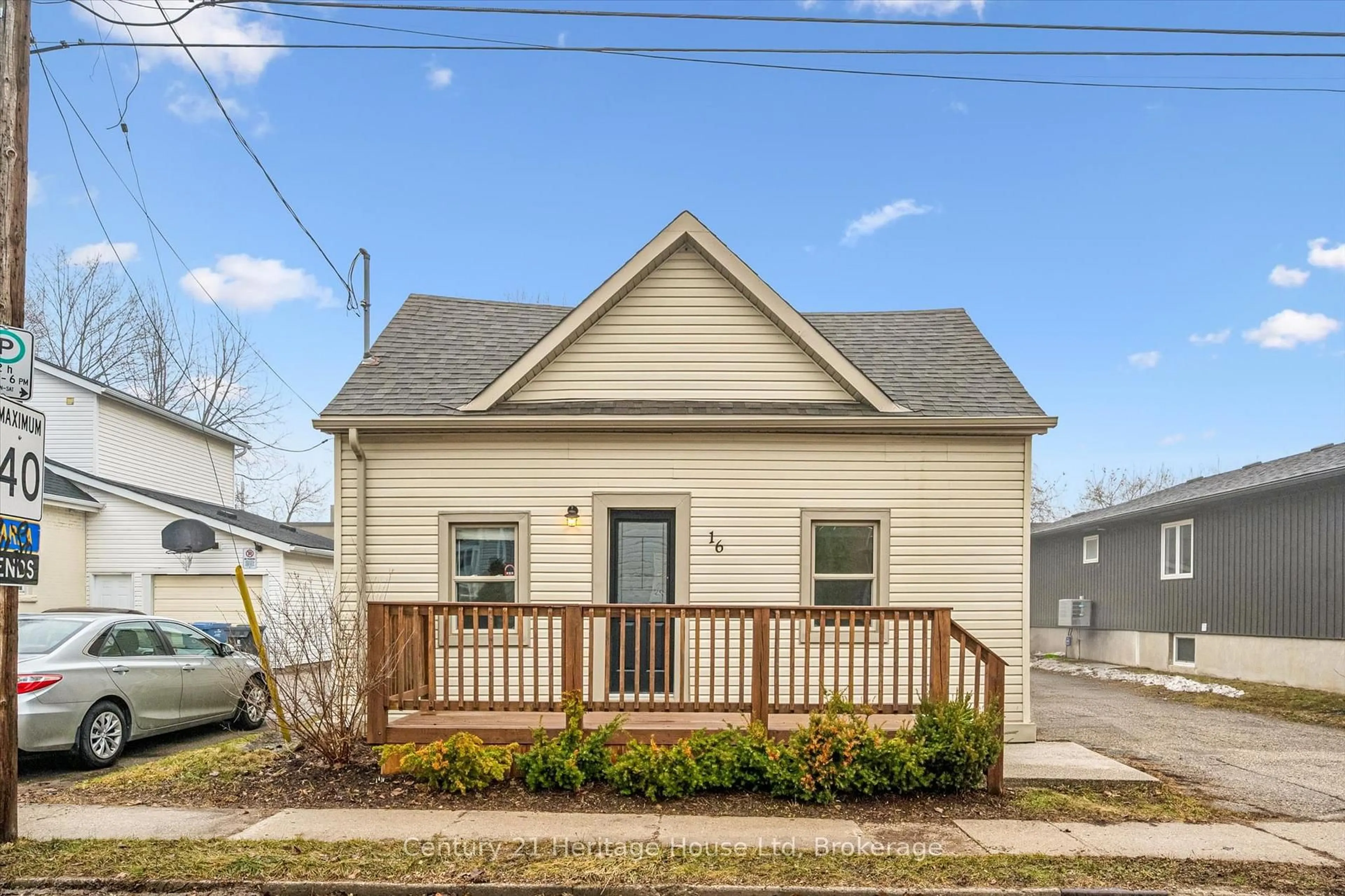 Home with vinyl exterior material, street for 16 Hooper St, Guelph Ontario N1E 5W5