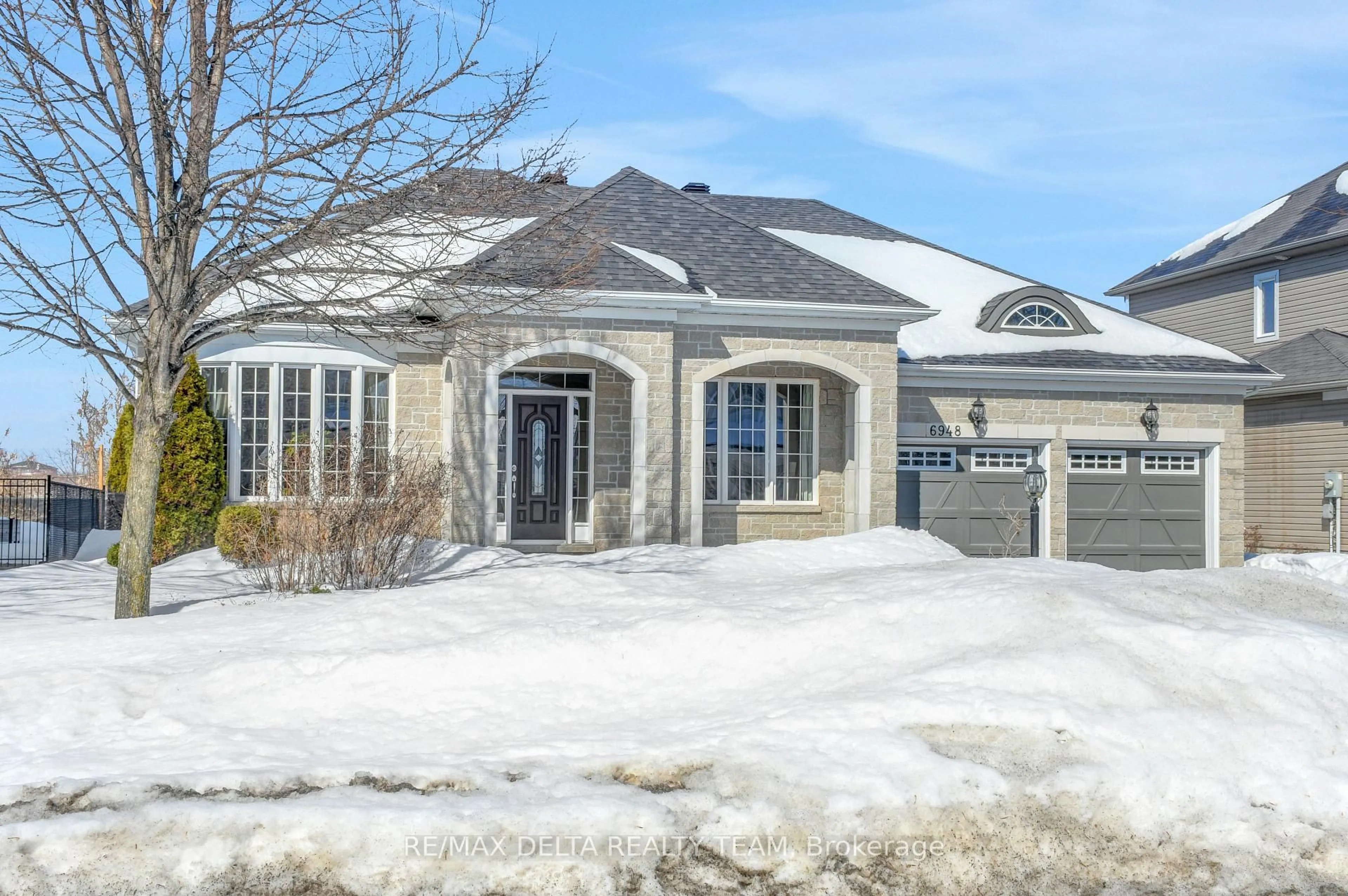 Home with brick exterior material, street for 6948 Mary Anne Dr, Ottawa Ontario K4P 0B9