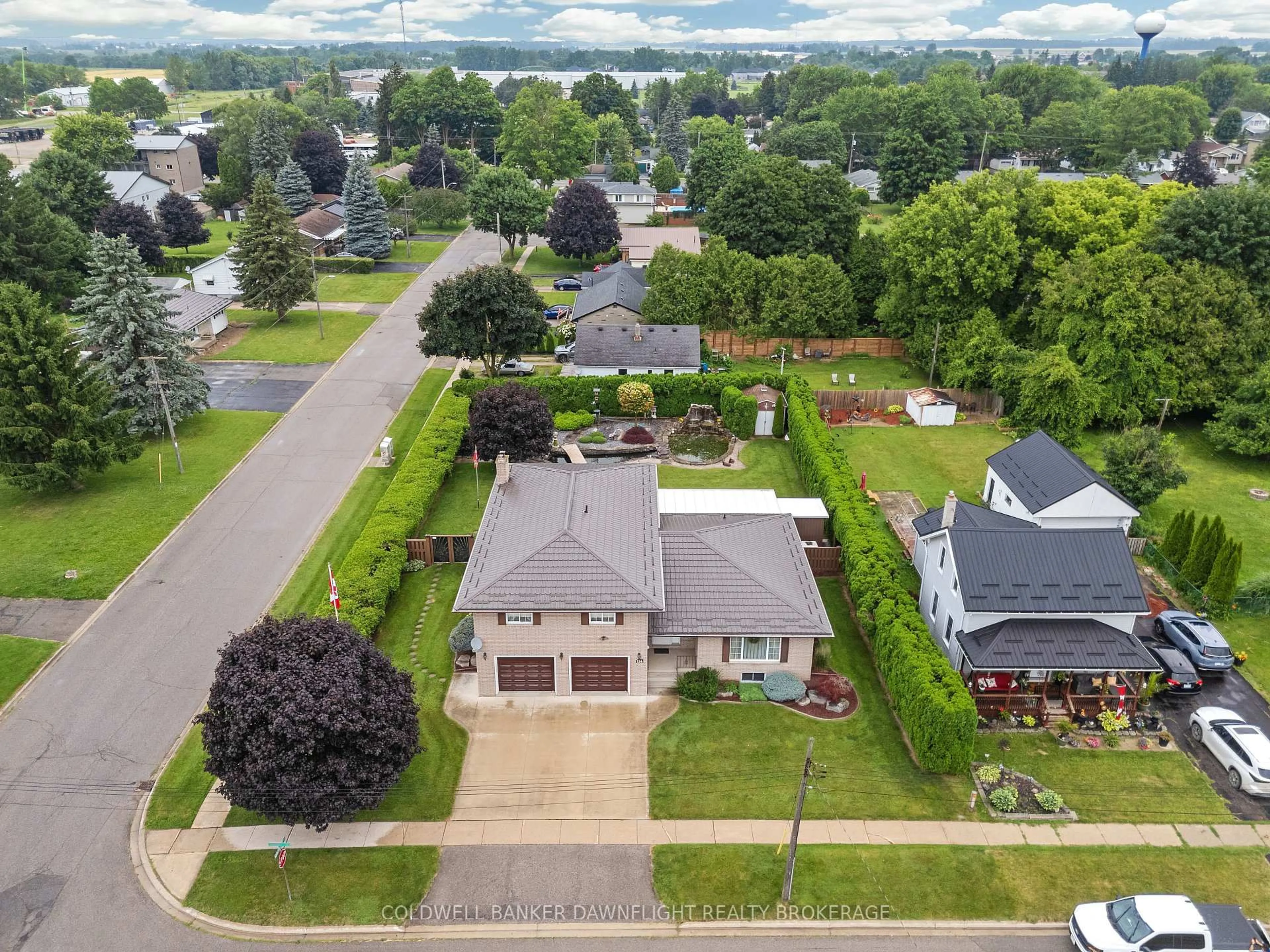 A pic from outside/outdoor area/front of a property/back of a property/a pic from drone, street for 154 Gidley St, South Huron Ontario N0M 1S2