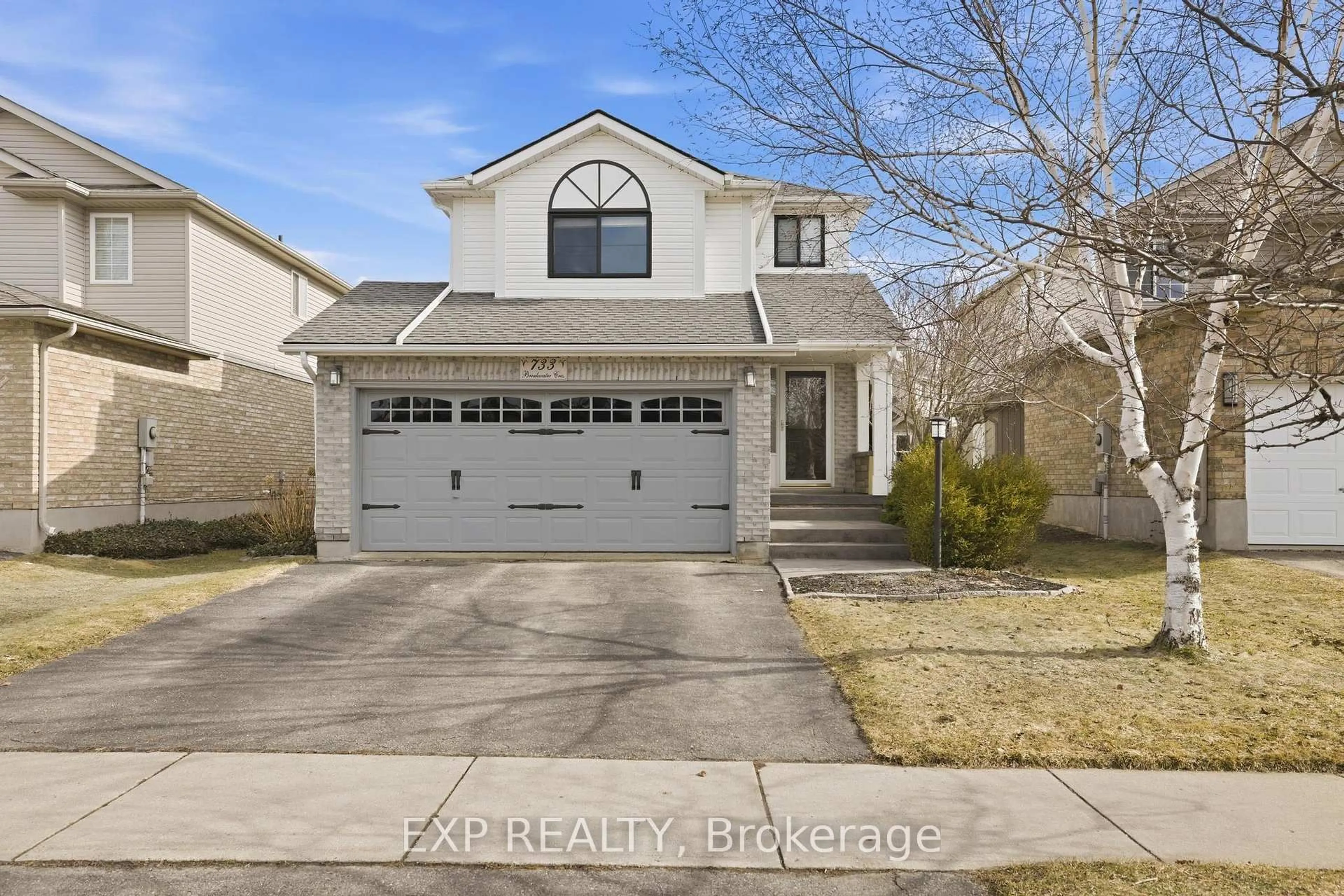 Home with vinyl exterior material, street for 733 Breakwater Cres, Waterloo Ontario N2K 4H8