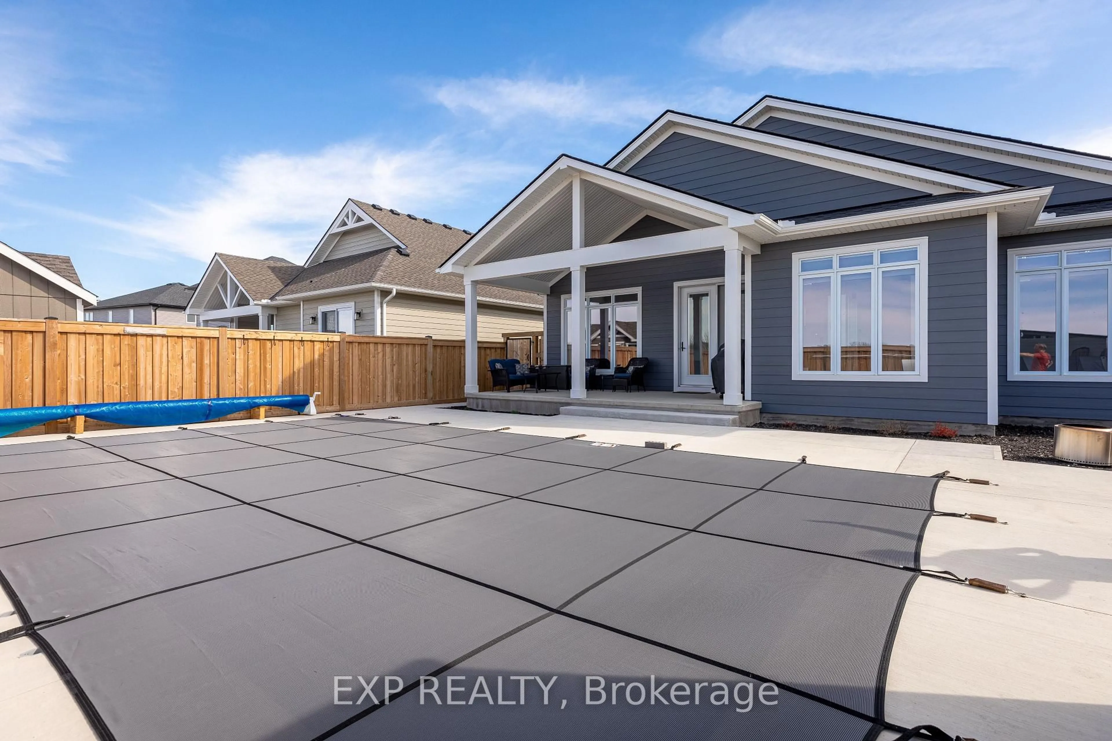 A pic from outside/outdoor area/front of a property/back of a property/a pic from drone, street for 56 Optimist Dr, Southwold Ontario N5P 0G4