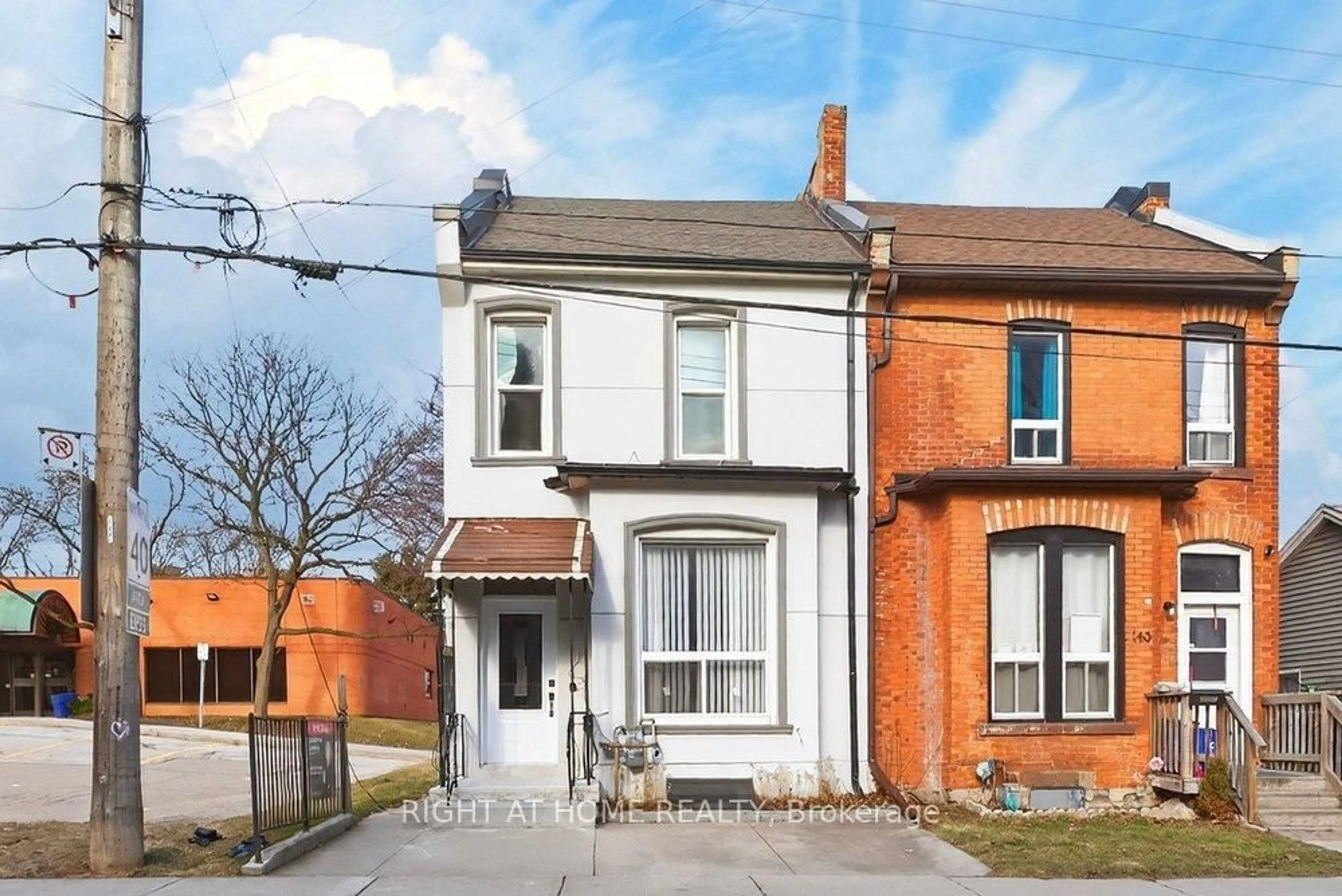 Home with brick exterior material, street for 141 Ray St, Hamilton Ontario L8R 2Y3