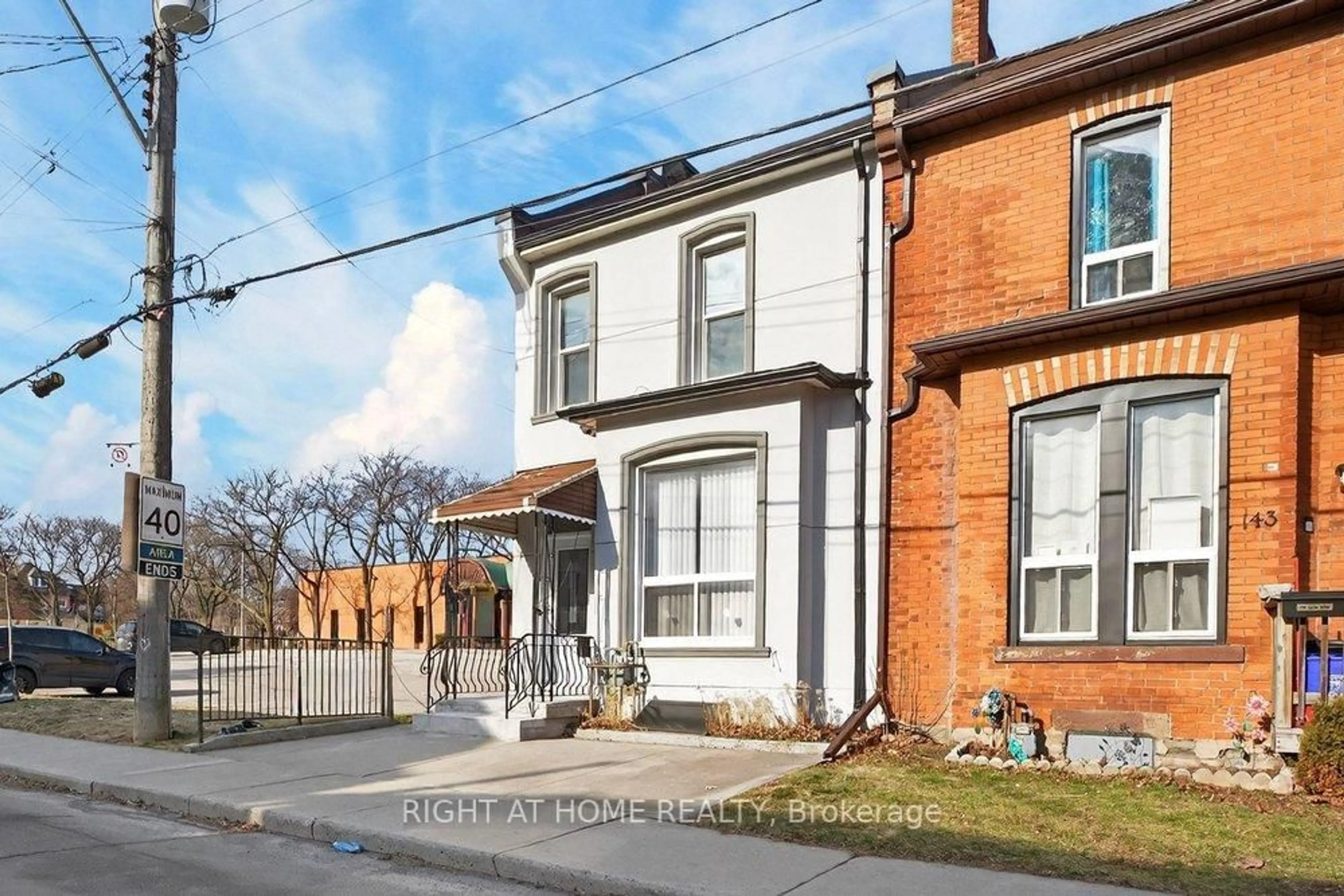 Home with brick exterior material, street for 141 Ray St, Hamilton Ontario L8R 2Y3