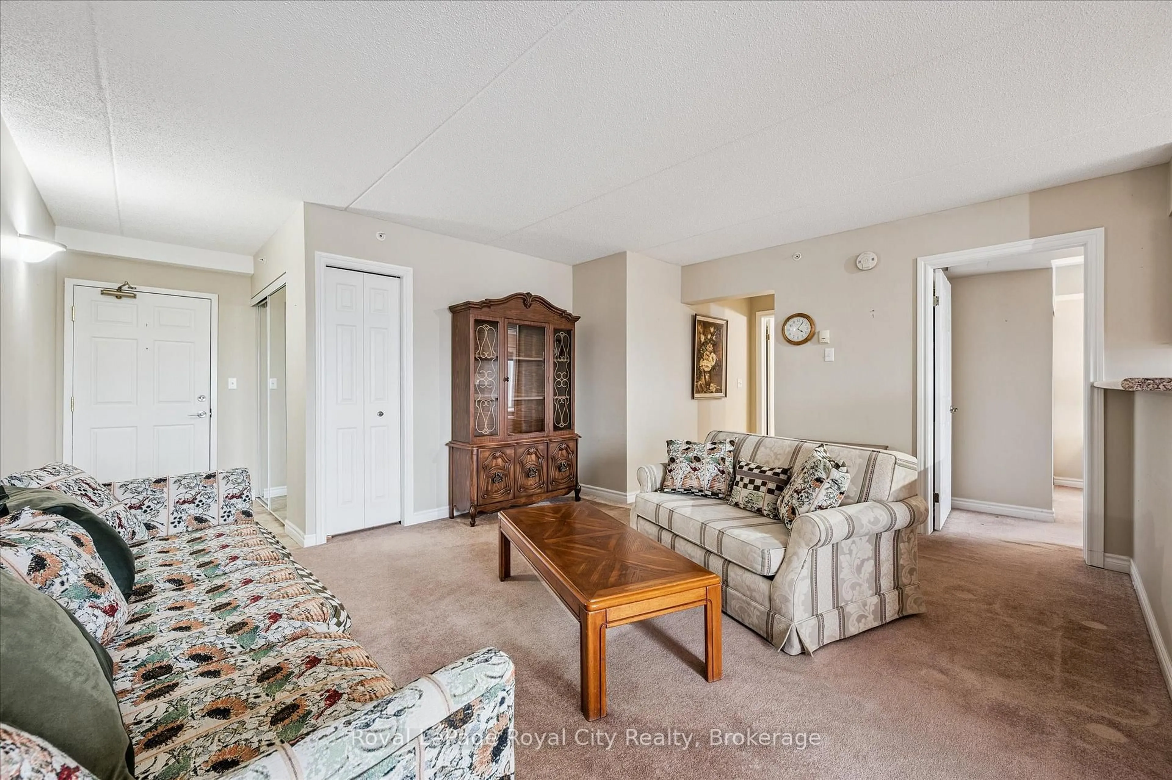 Living room with furniture, carpet floor for 415 Grange Rd #306, Guelph Ontario N1E 0C4