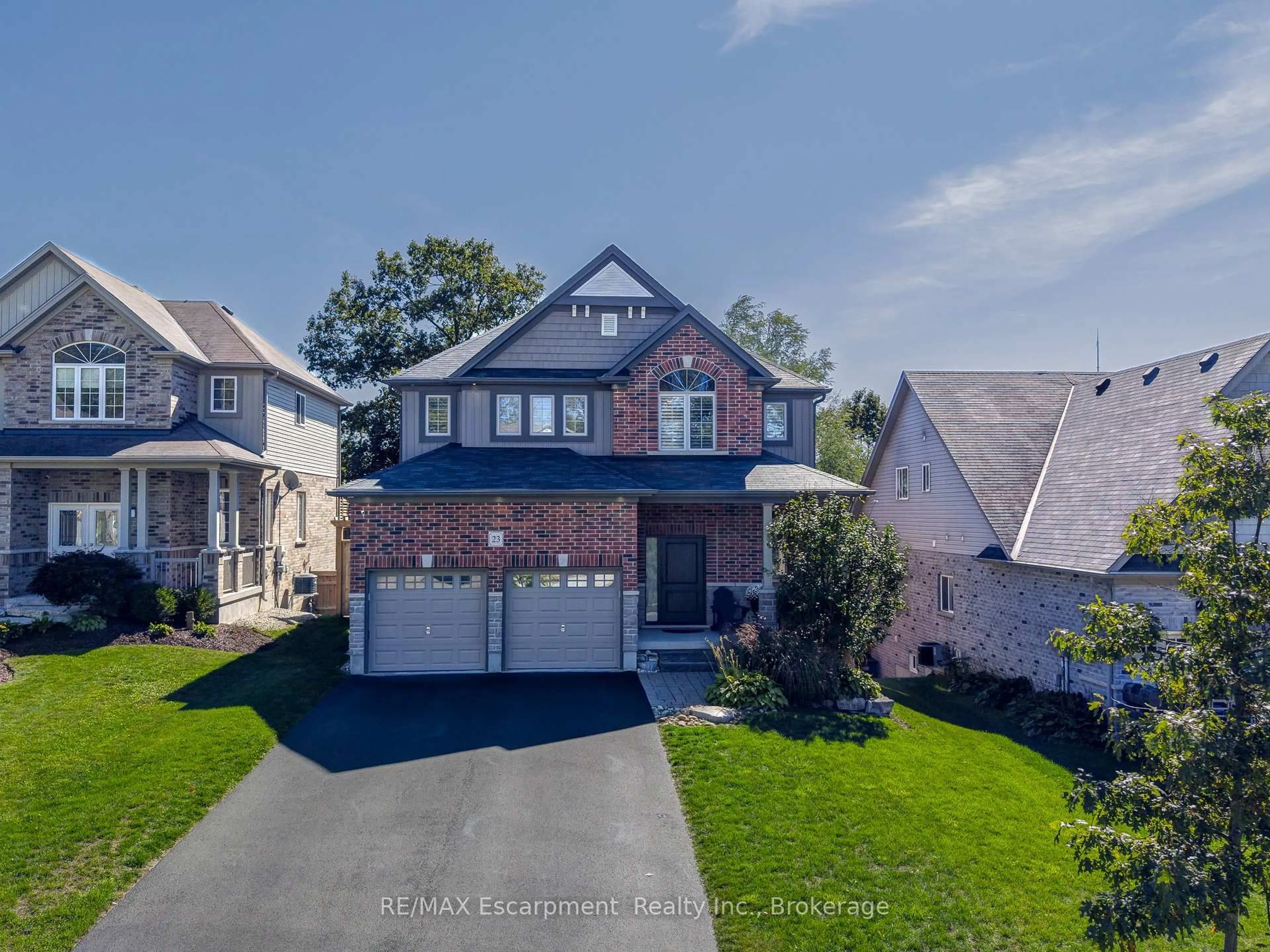 A pic from outside/outdoor area/front of a property/back of a property/a pic from drone, street for 23 Howard Marshall St, North Dumfries Ontario N0B 1E0