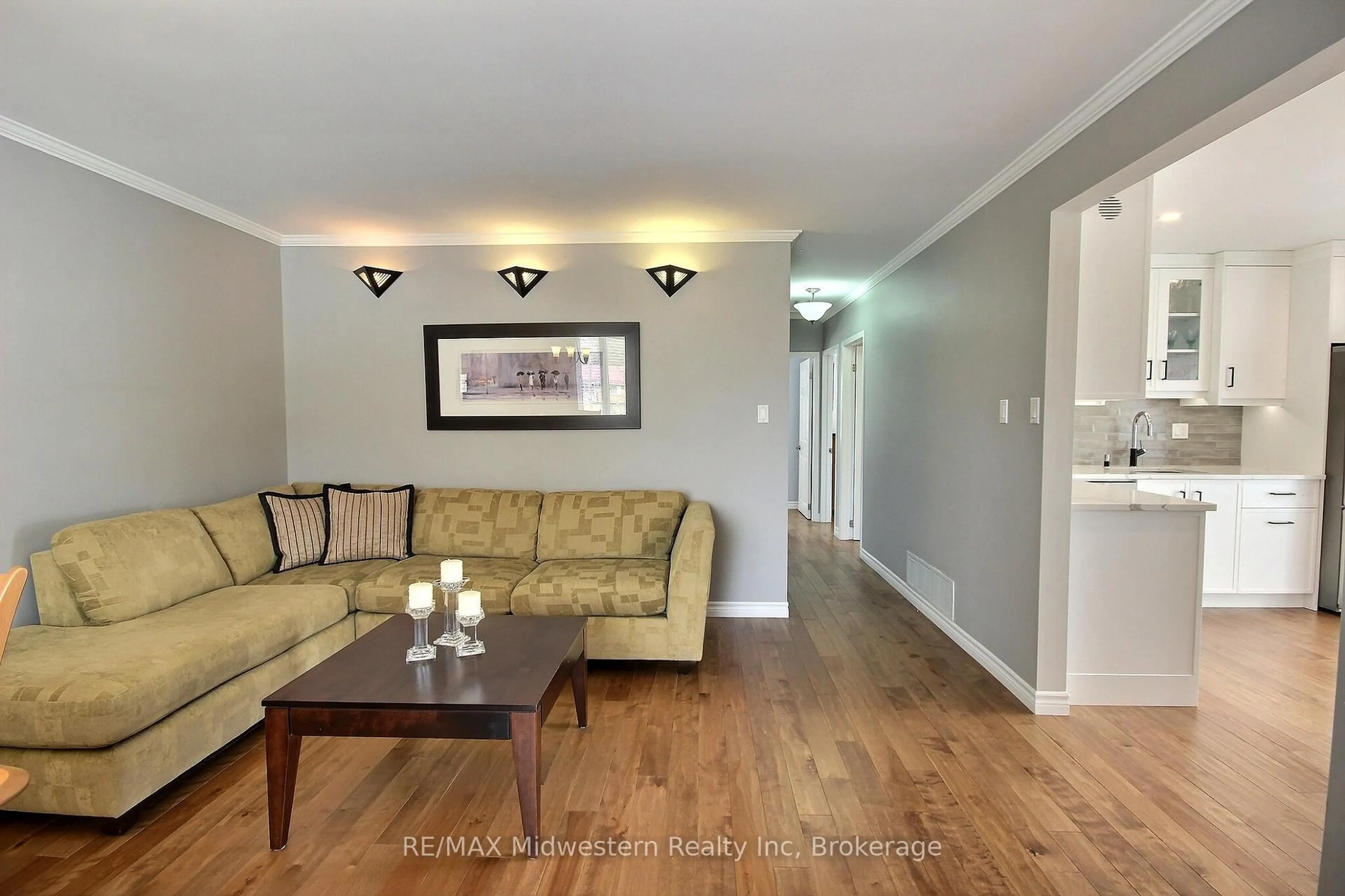 Living room with furniture, wood/laminate floor for 823016 Massie Rd, Chatsworth Ontario N0H 1G0