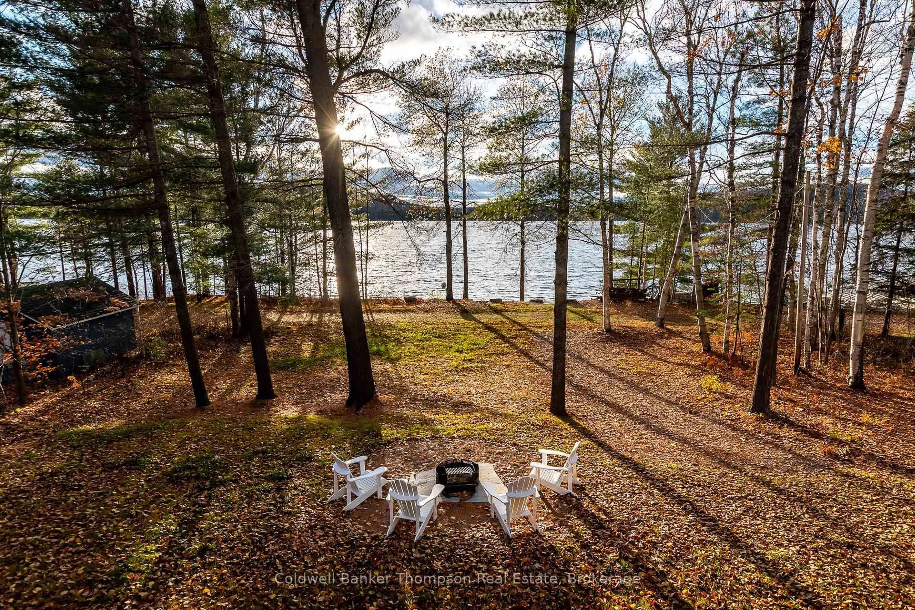 A pic from outside/outdoor area/front of a property/back of a property/a pic from drone, water/lake/river/ocean view for 1204 Seabreeze Rd, Lake of Bays Ontario P0A 1H0