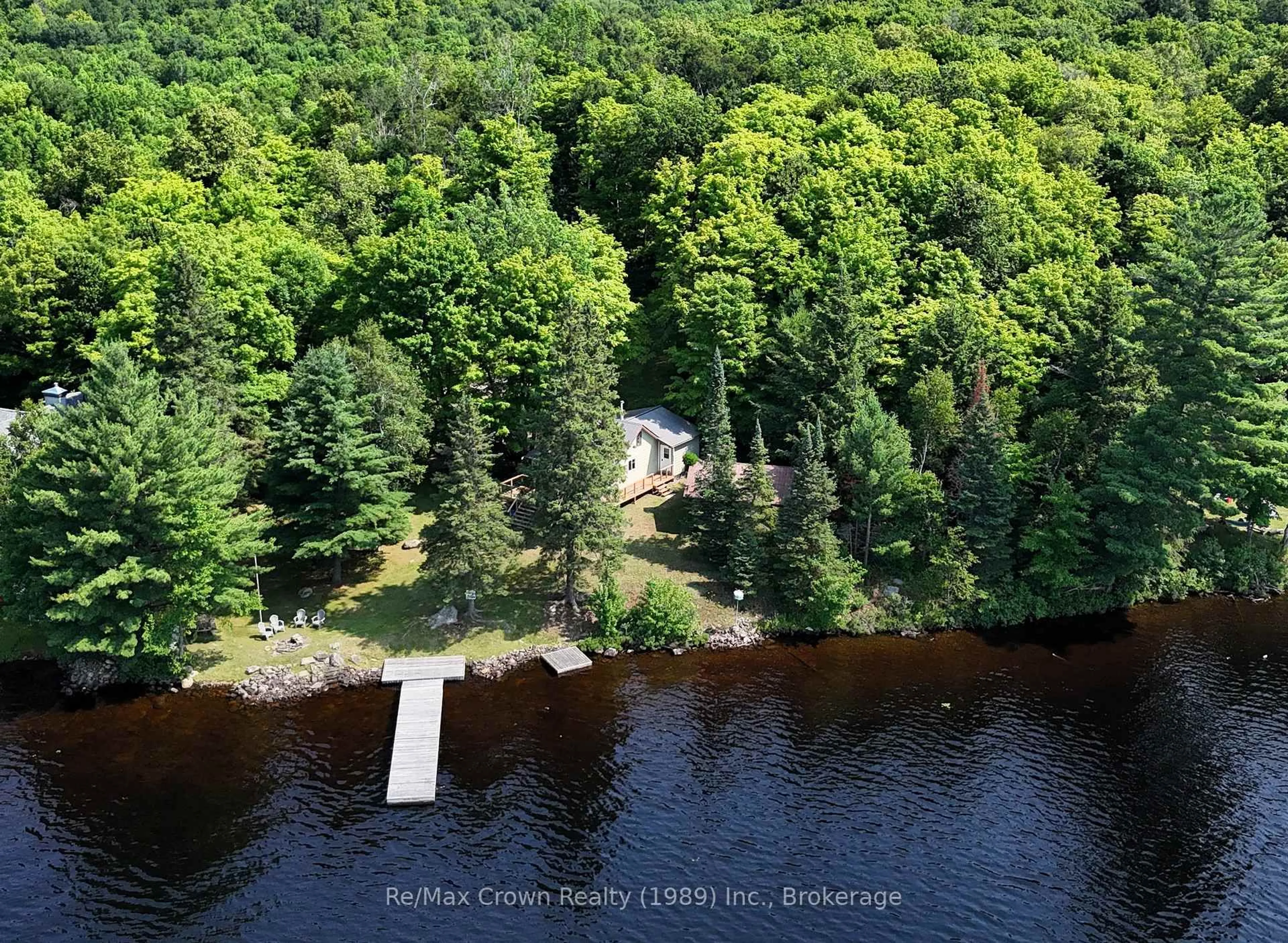 A pic from outside/outdoor area/front of a property/back of a property/a pic from drone, water/lake/river/ocean view for 131 Lee Lane, Parry Sound Remote Area Ontario P0H 1S0