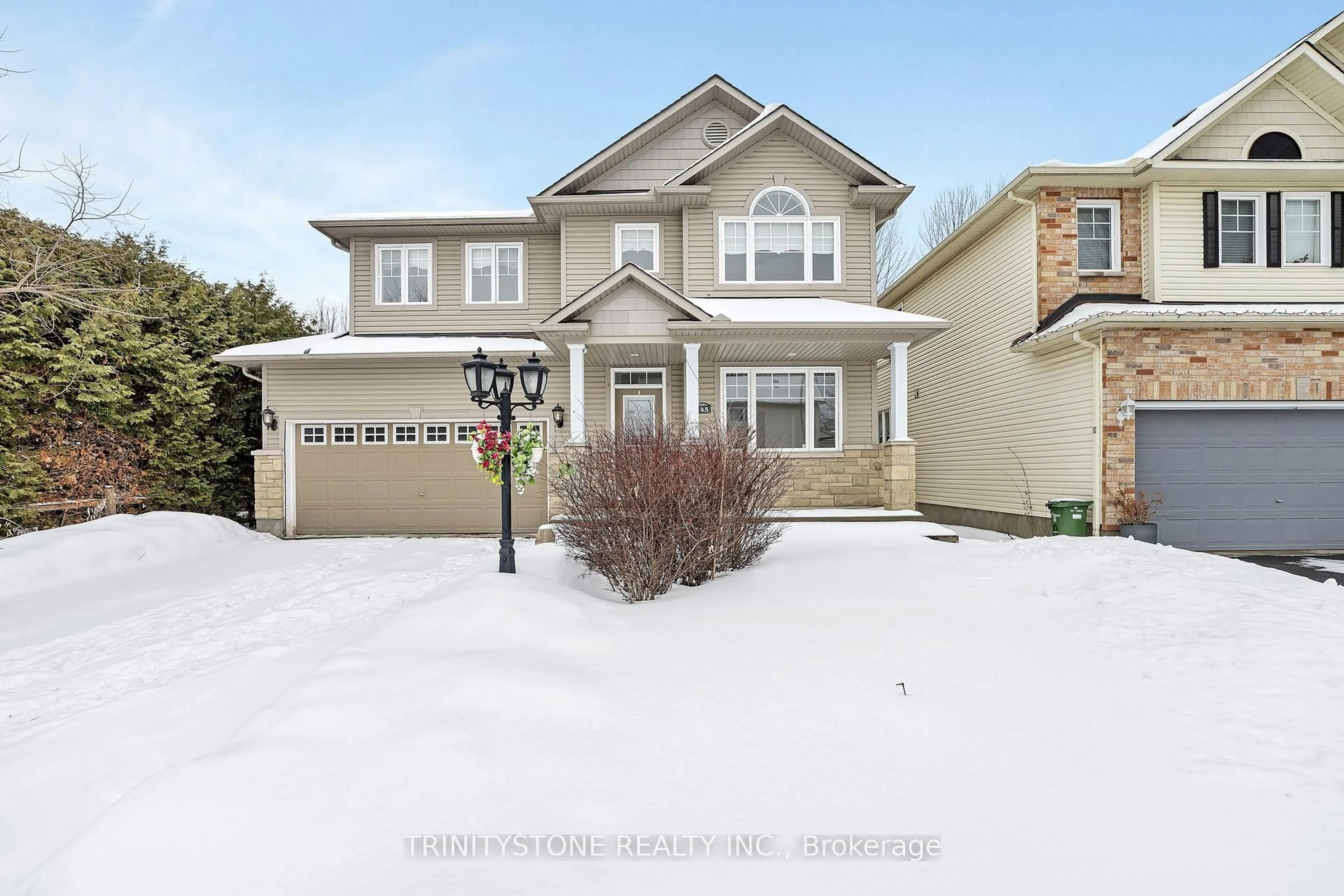 Home with vinyl exterior material, street for 145 Arrowwood Dr, Stittsville Ontario K2S 2G3