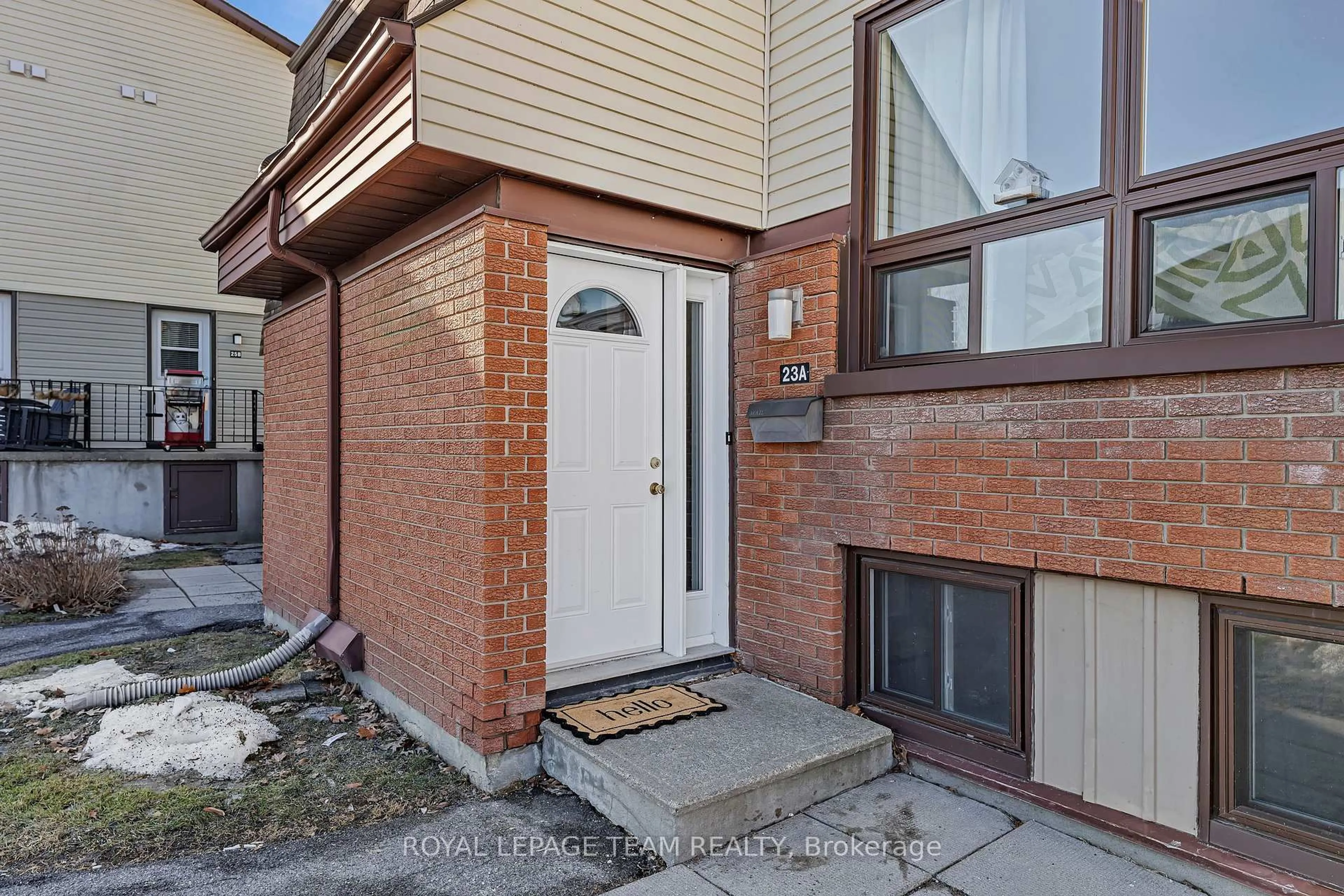 Home with brick exterior material, street for 23A Woodvale Green, Ottawa Ontario K2G 4H3