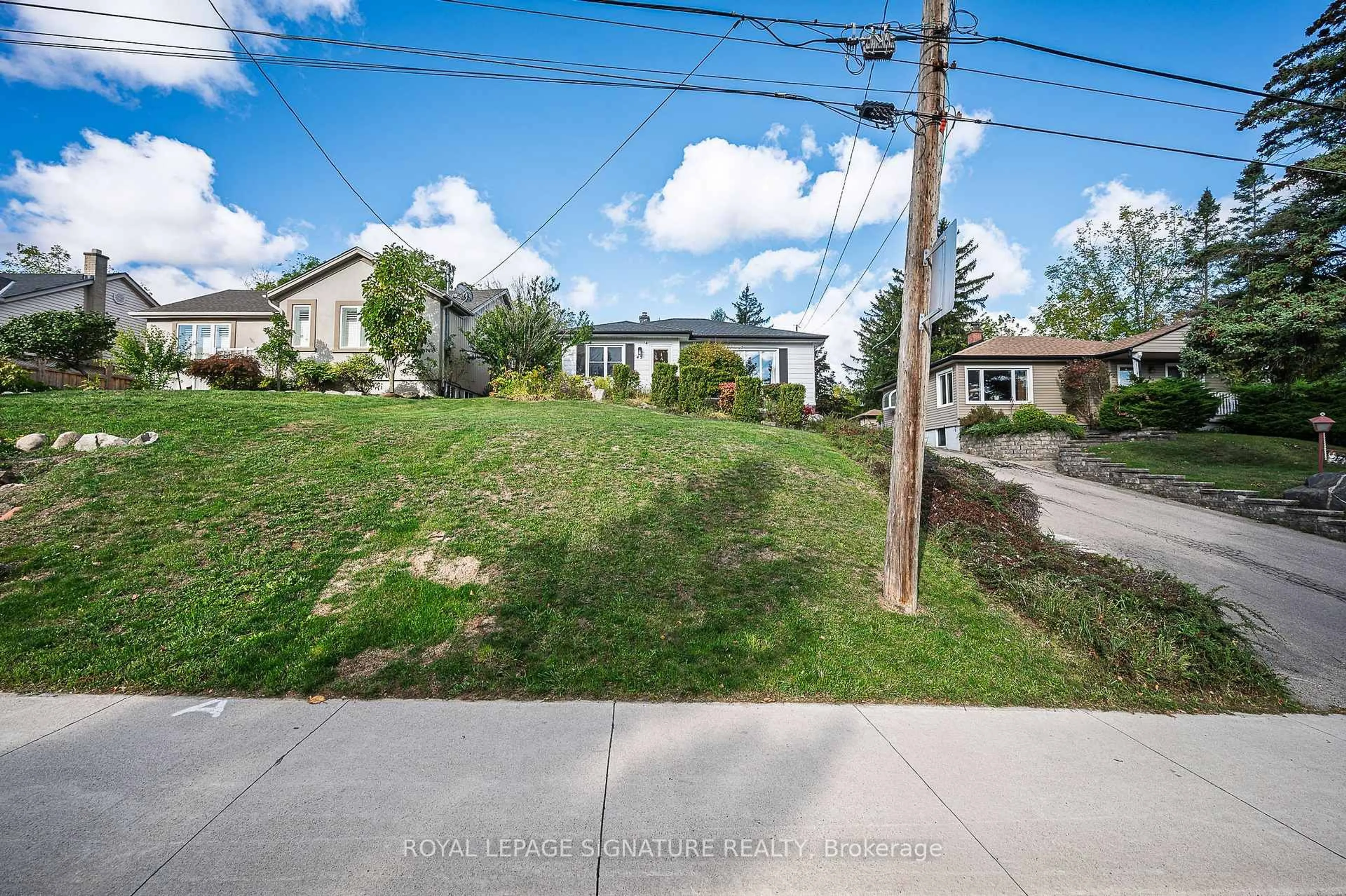 A pic from outside/outdoor area/front of a property/back of a property/a pic from drone, street for 43 Lake Ave, Hamilton Ontario L8E 1L2
