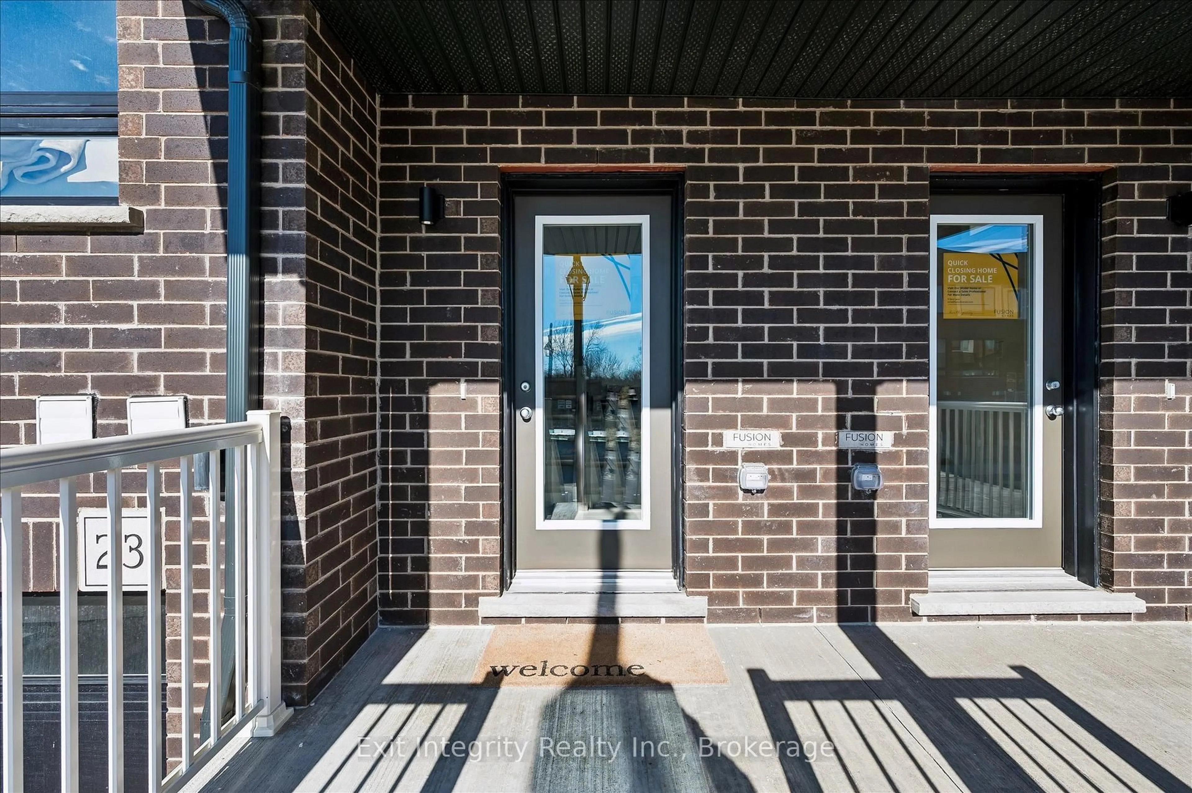 Home with brick exterior material, street for 23 Sora Lane, Guelph Ontario N1E 0T4