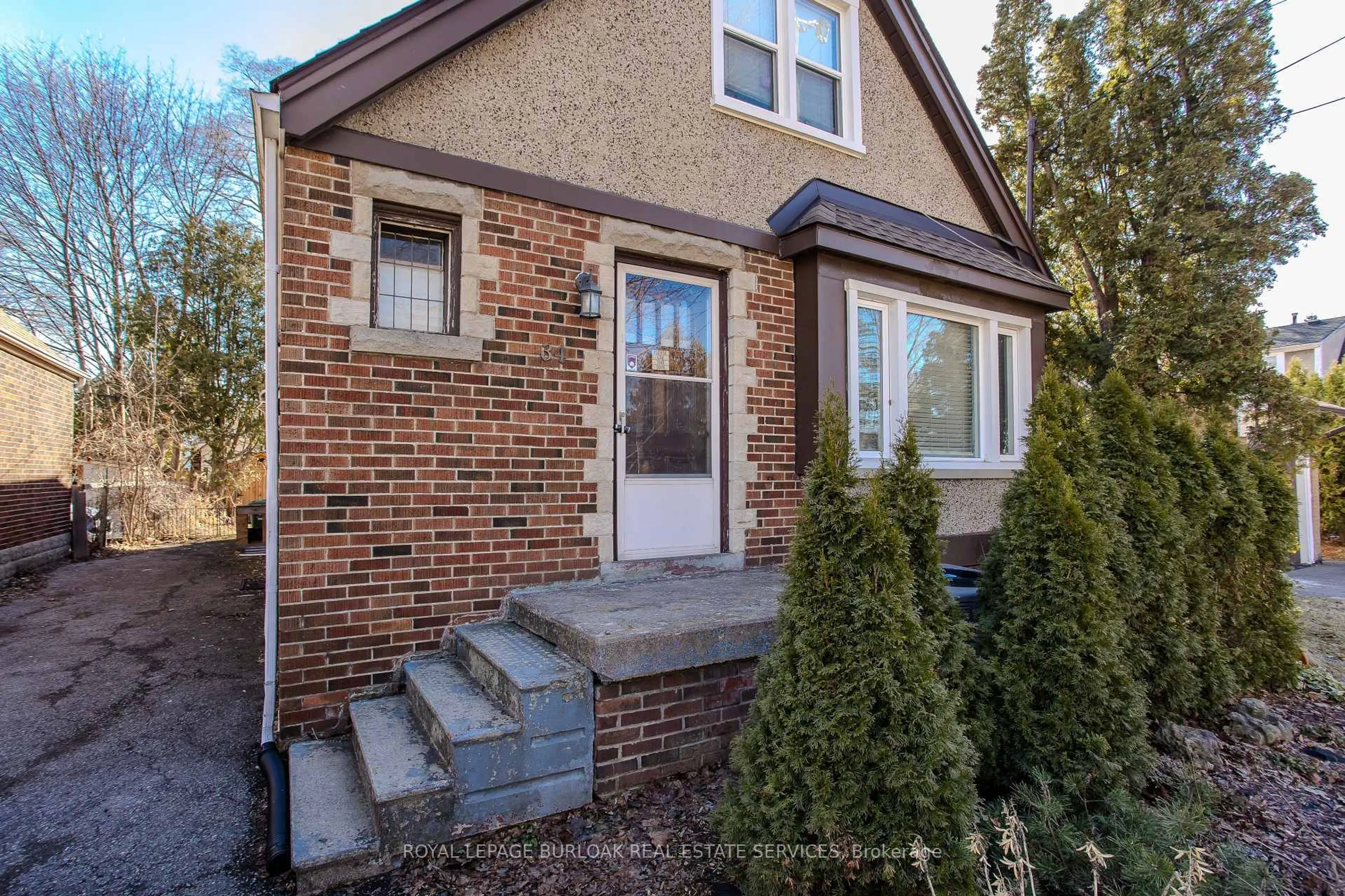 Home with brick exterior material, street for 34 Hollywood St, Hamilton Ontario L8S 3K6