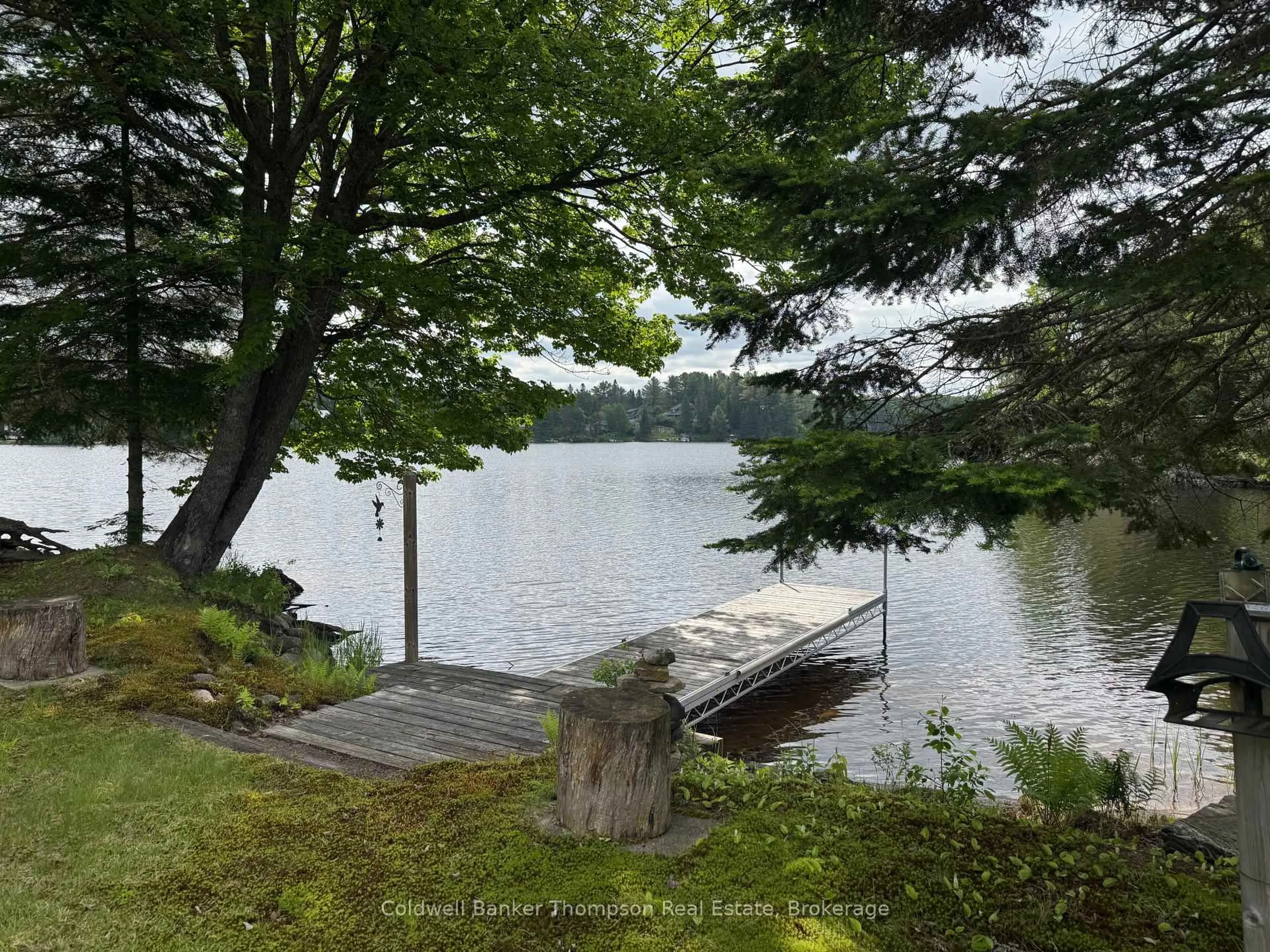 A pic from outside/outdoor area/front of a property/back of a property/a pic from drone, water/lake/river/ocean view for 105 Pineaire Lane, Perry Ontario P0A 1M0