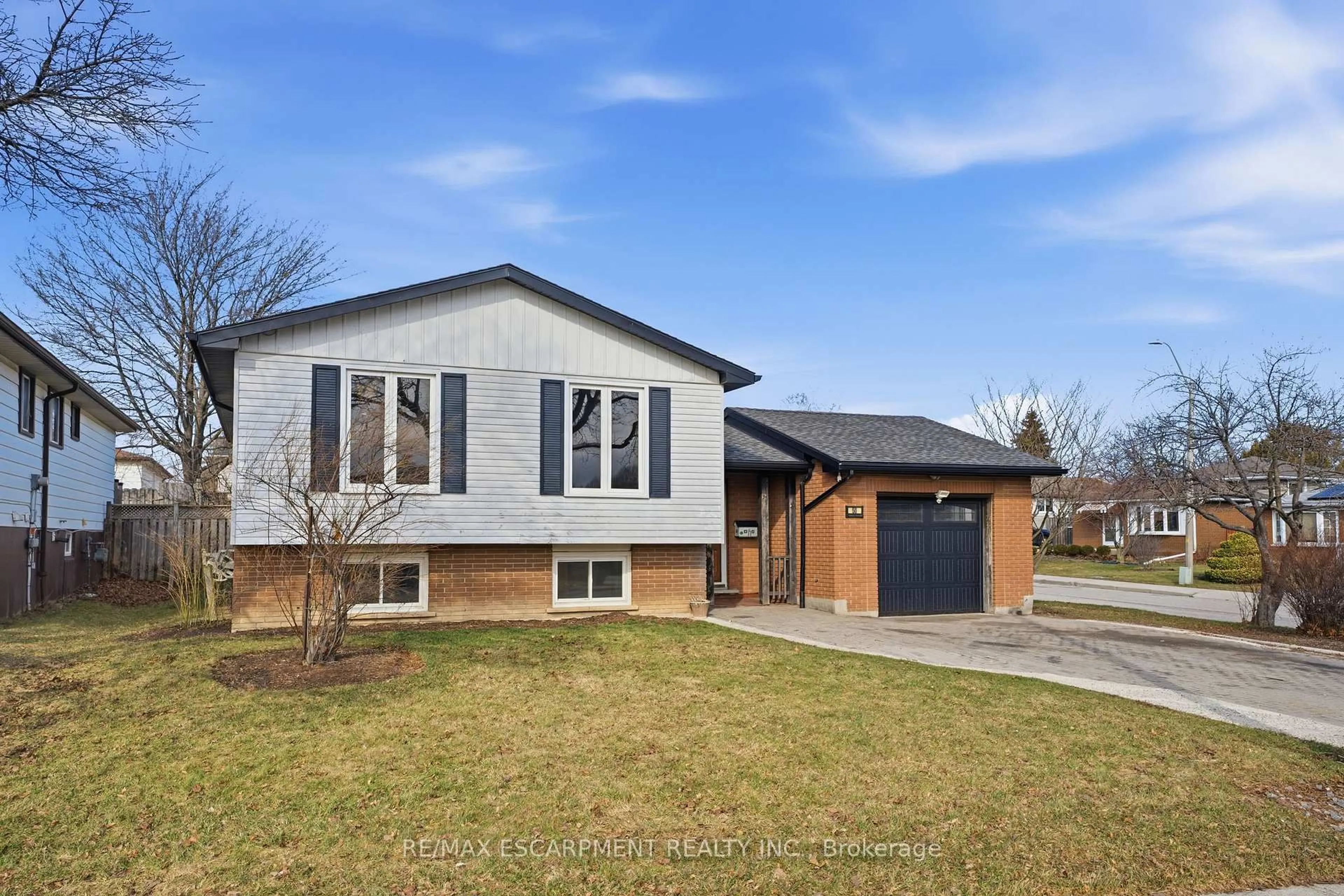 Home with brick exterior material, street for 50 Lawnhurst Dr, Hamilton Ontario L8V 4P1