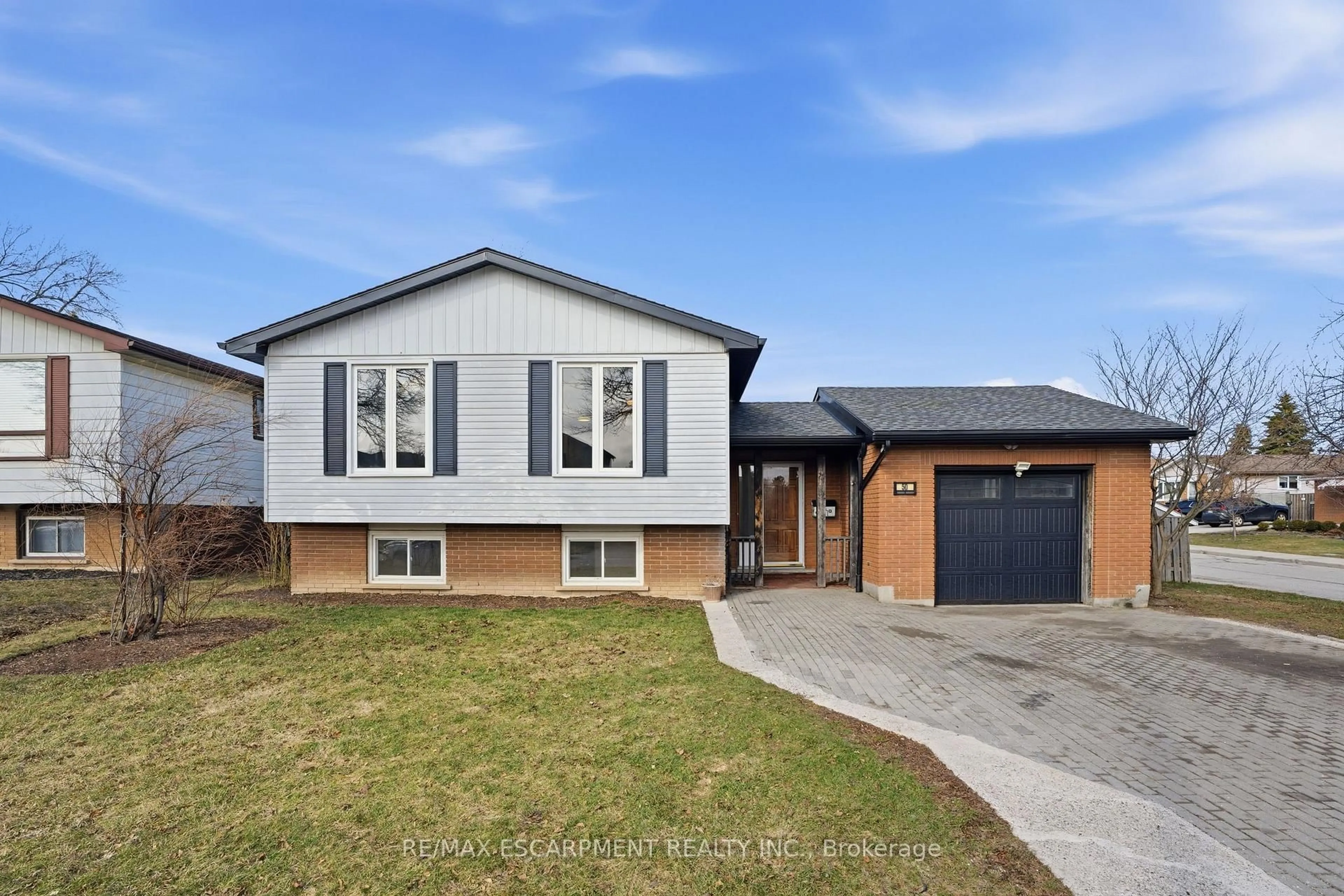 Home with brick exterior material, street for 50 Lawnhurst Dr, Hamilton Ontario L8V 4P1
