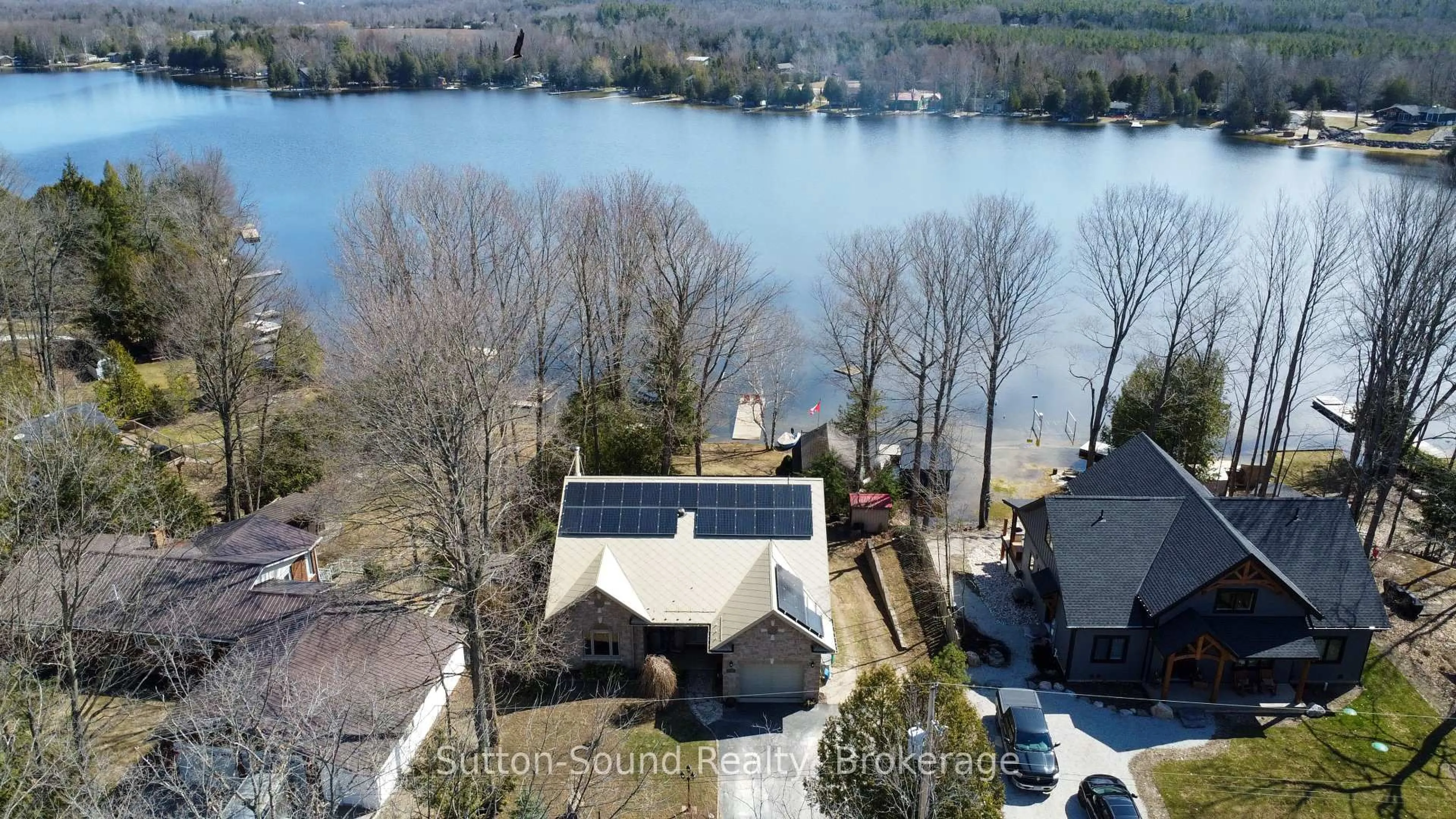 A pic from outside/outdoor area/front of a property/back of a property/a pic from drone, water/lake/river/ocean view for 122 Mccullough Lake Dr, Chatsworth Ontario N0H 2V0