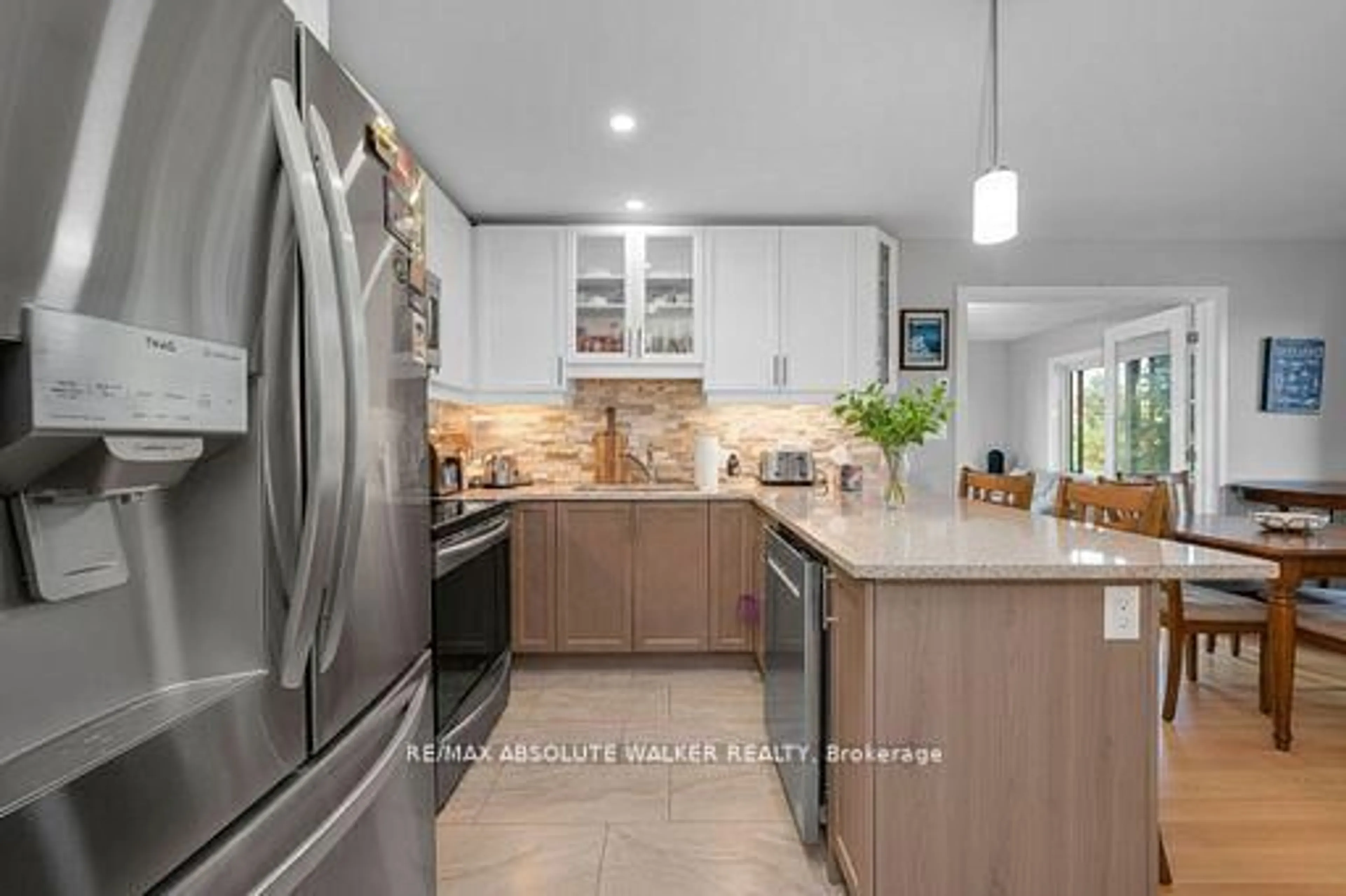 Open concept kitchen, ceramic/tile floor for 102 Sophie Lane, Merrickville-Wolford Ontario K0G 1N0