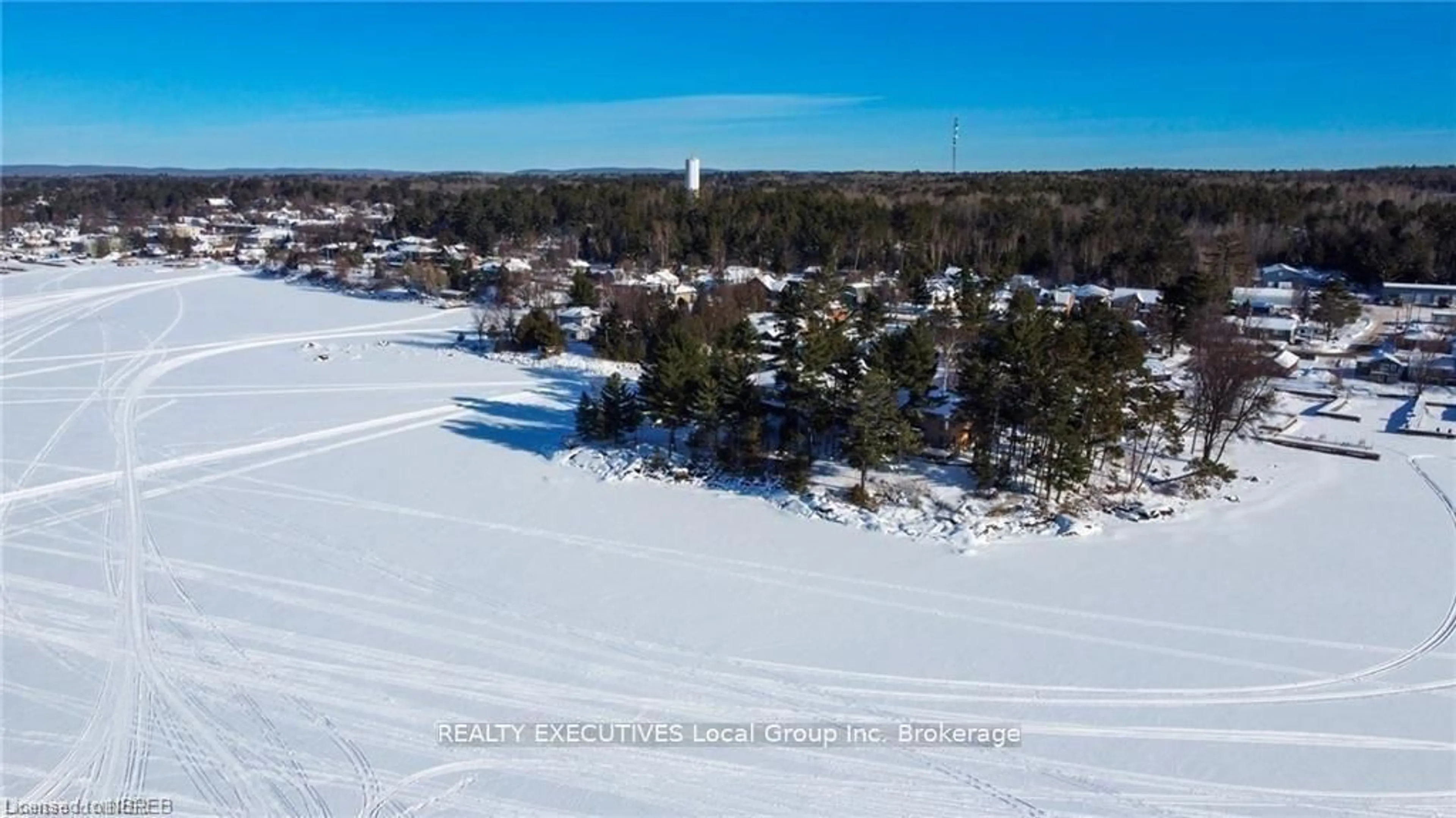 A pic from outside/outdoor area/front of a property/back of a property/a pic from drone, water/lake/river/ocean view for 555 Main St #5, Callander Ontario P0H 1H0