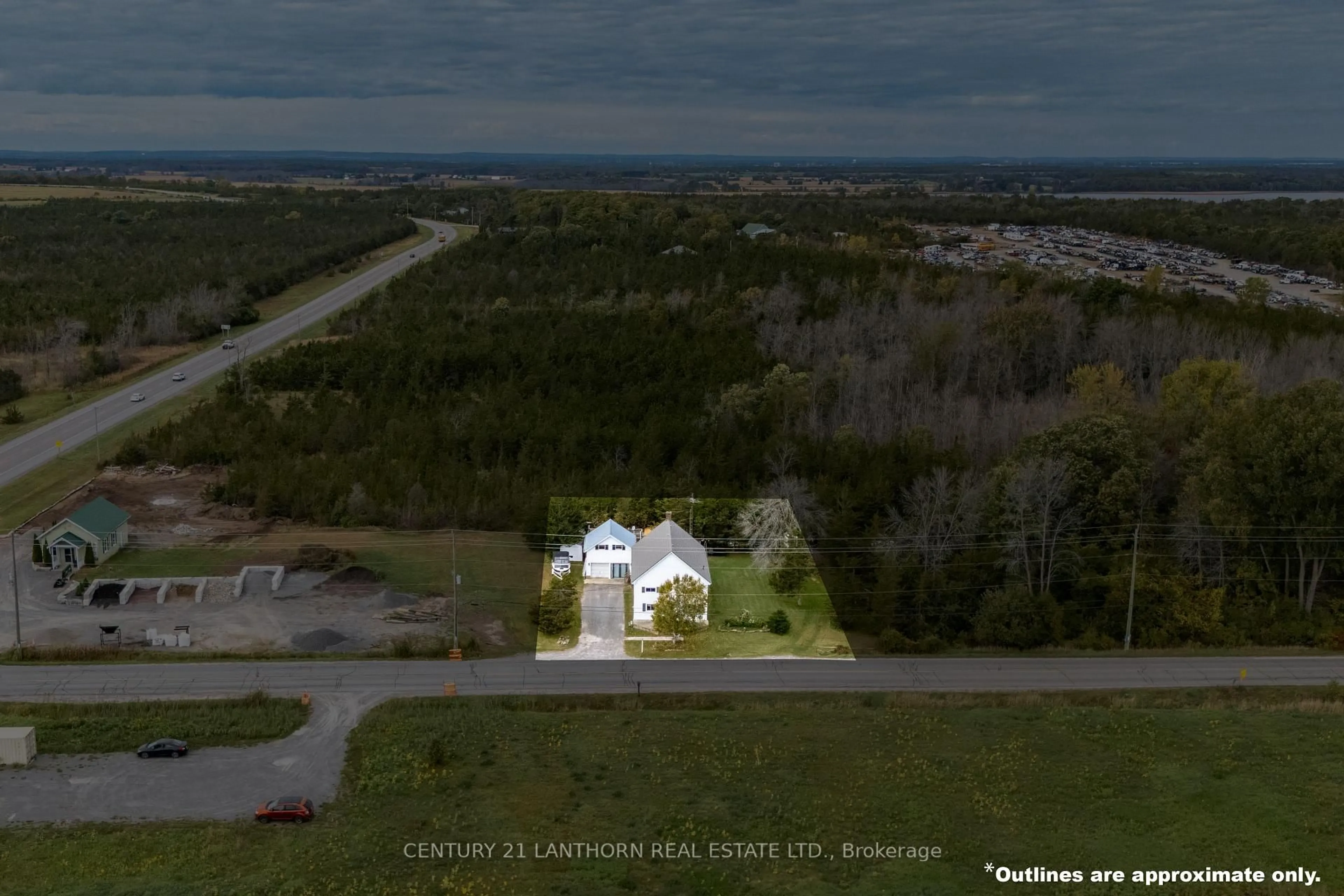 A pic from outside/outdoor area/front of a property/back of a property/a pic from drone, unknown for 1868 County Road 14 Rd, Prince Edward County Ontario K0K 1A0