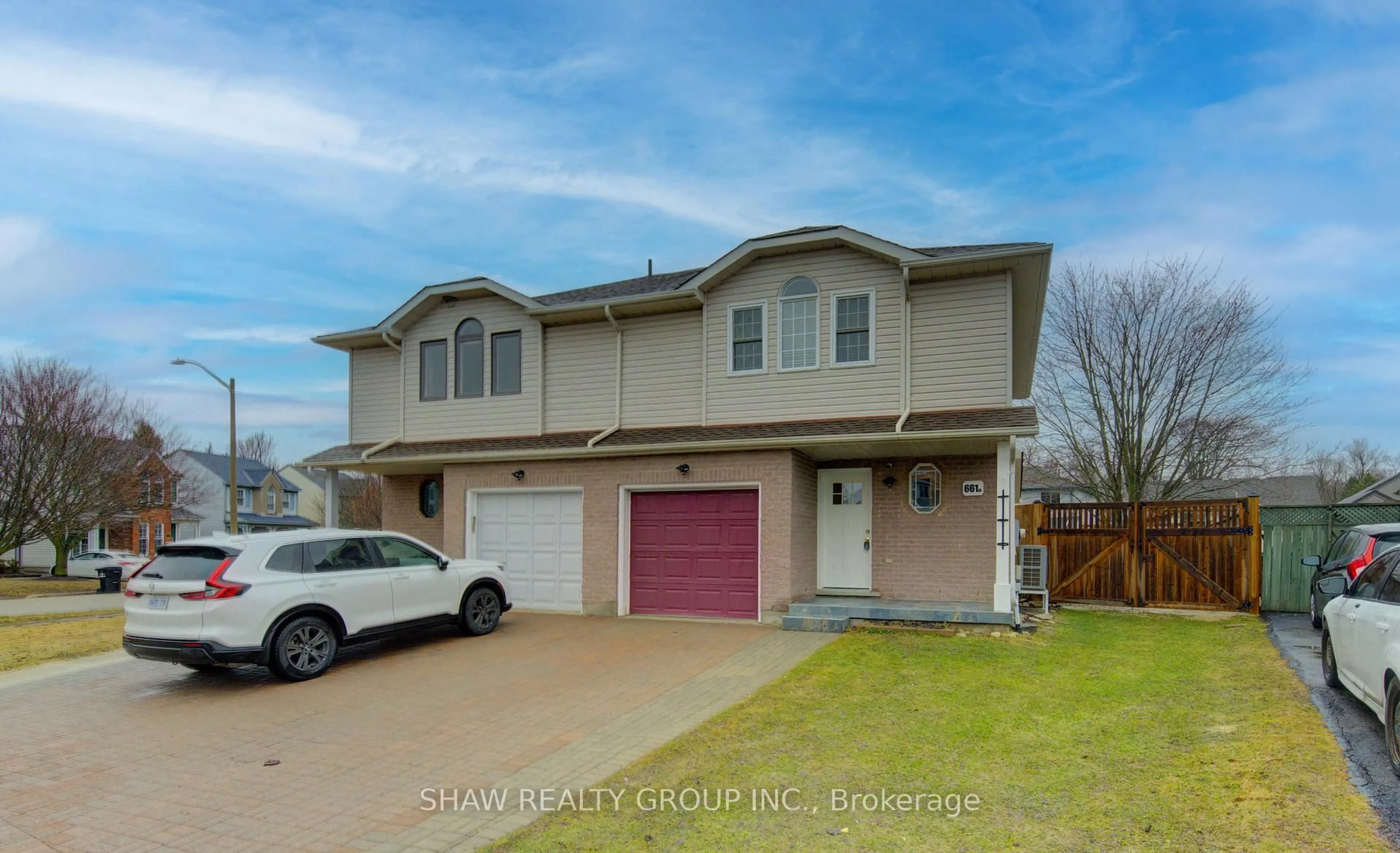 Home with vinyl exterior material, street for 661 Jacob Lane #B, Waterloo Ontario N2V 2G9