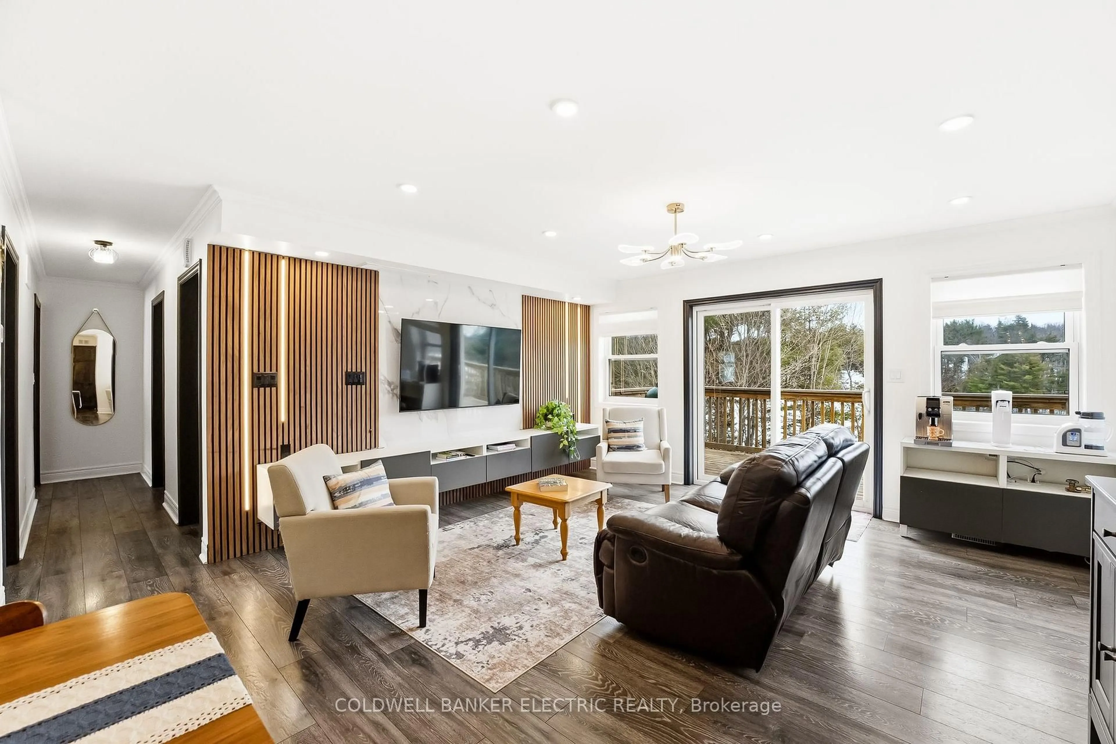 Living room with furniture, wood/laminate floor for 1211 Gelert Rd, Minden Hills Ontario K0M 2K0