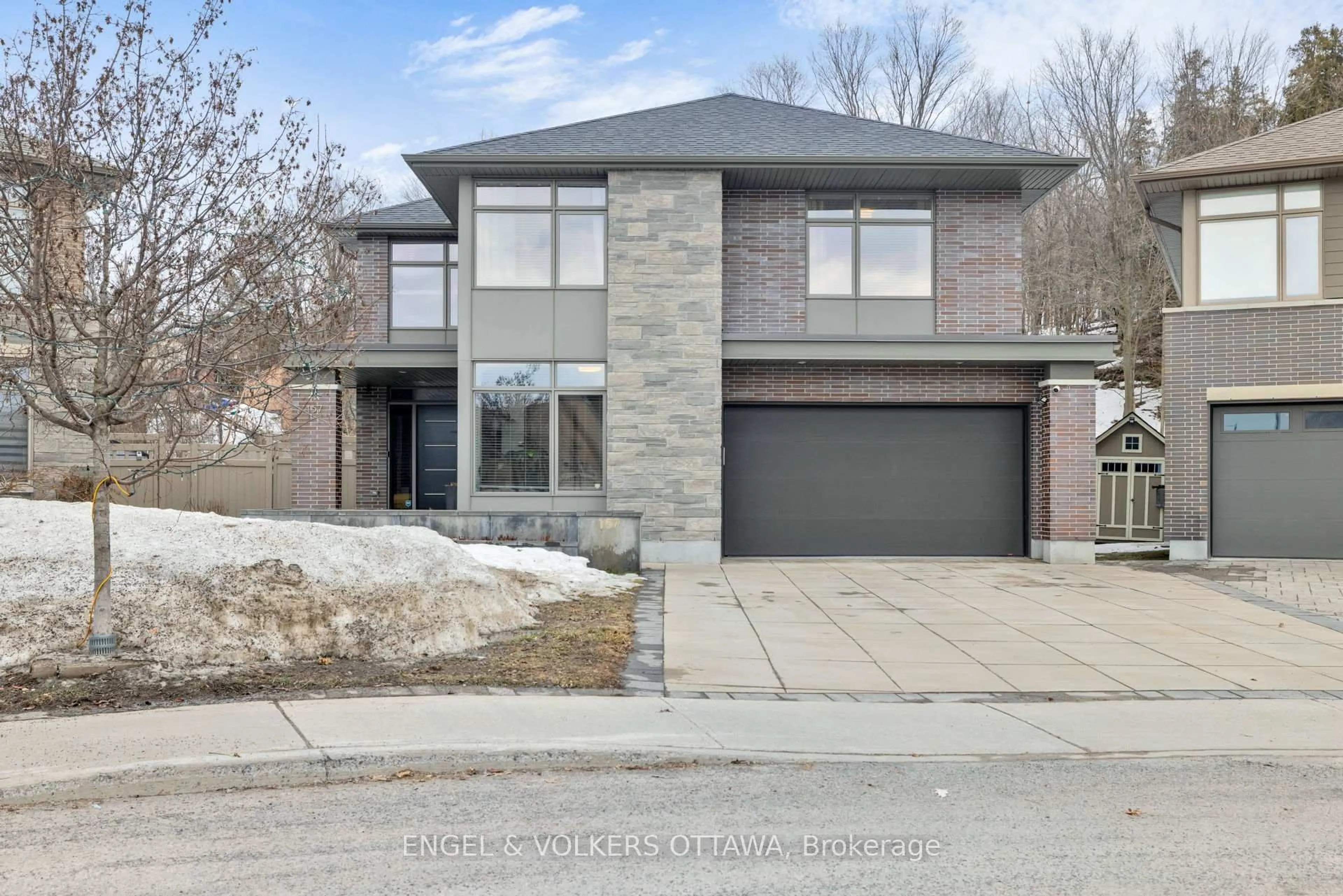 Home with brick exterior material, street for 157 Avro Circ, Ottawa Ontario K1K 4K7