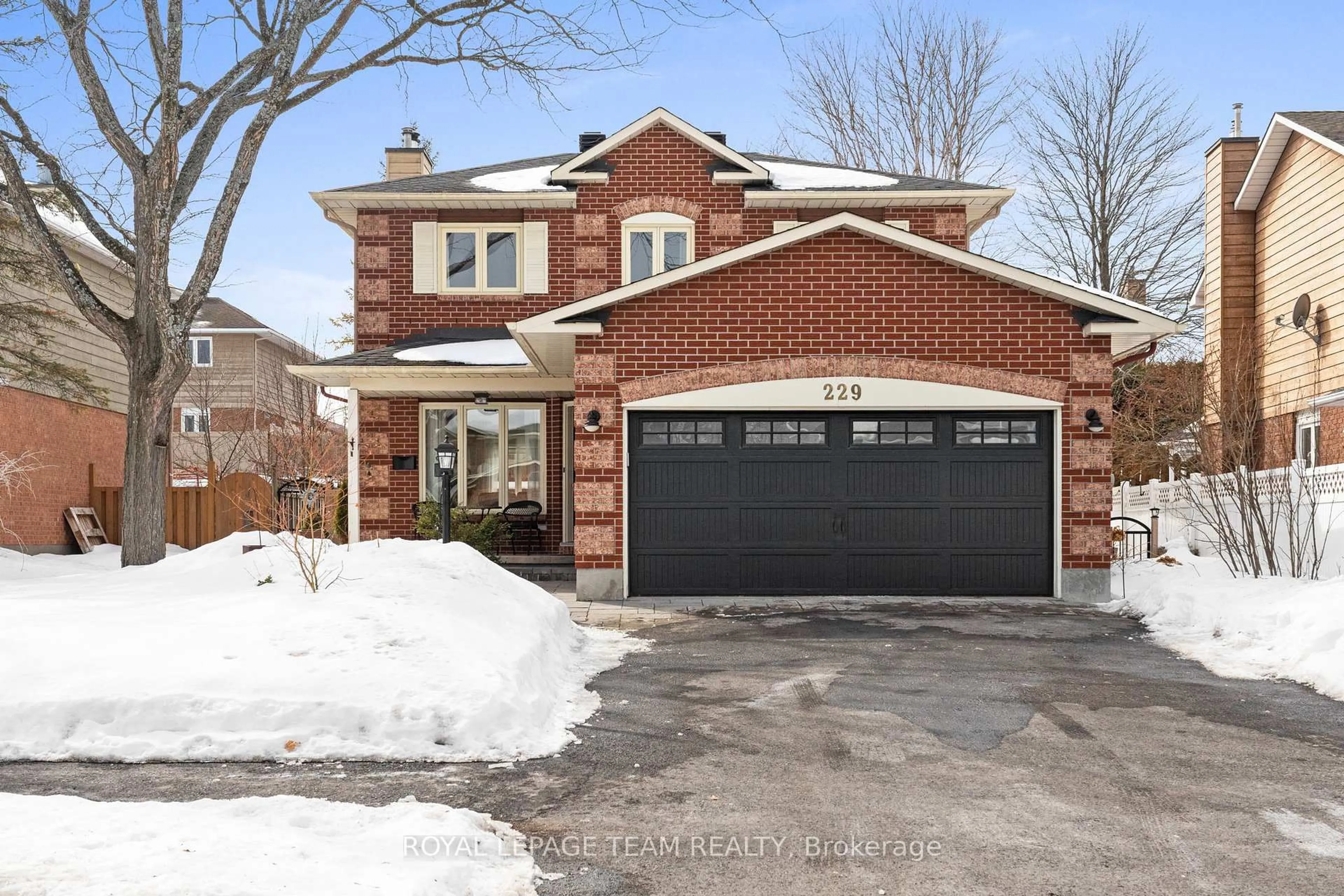 Home with brick exterior material, street for 229 Walden Dr, Ottawa Ontario K2K 2M3