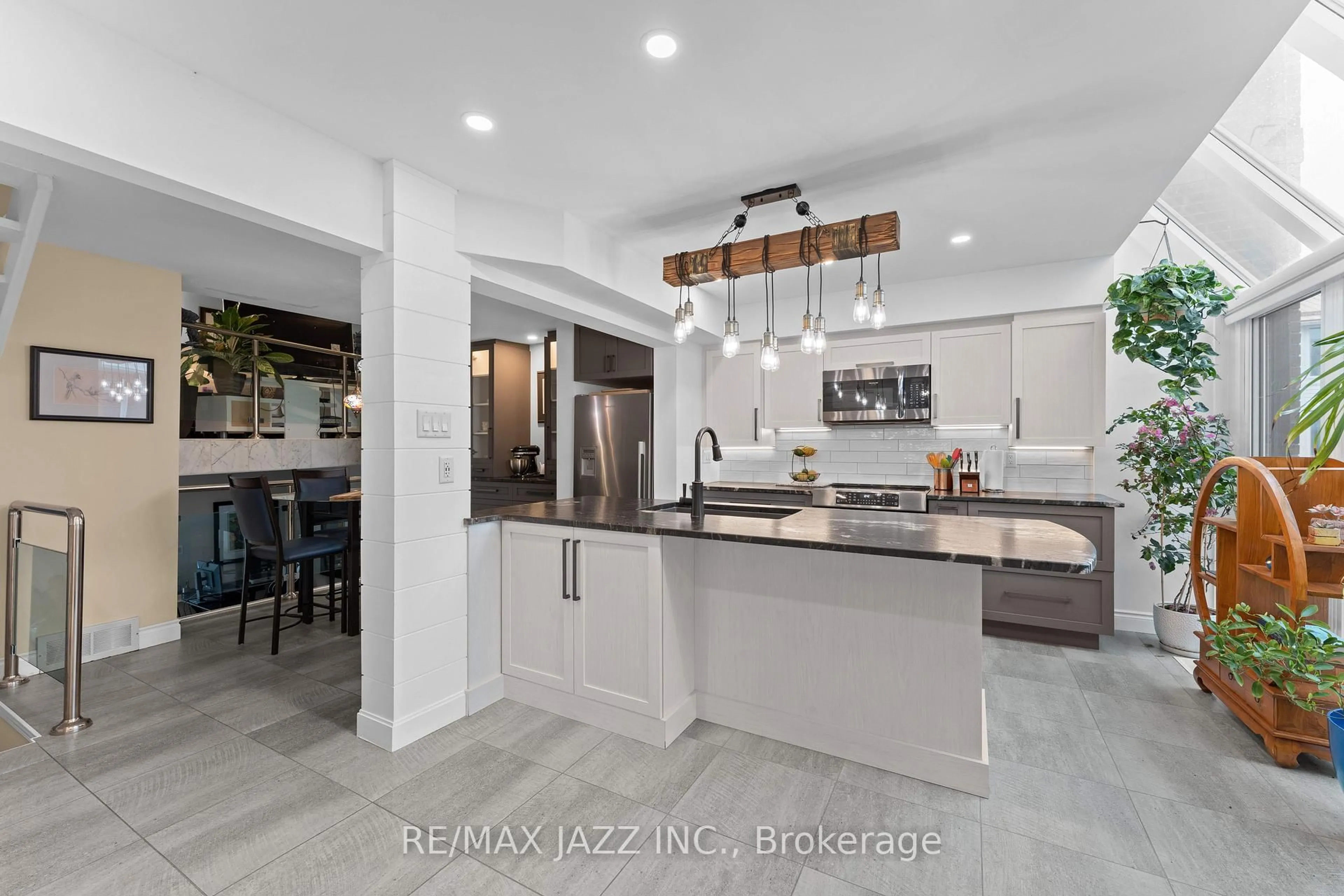 Open concept kitchen, ceramic/tile floor for 1 Place D'armes #48, Kingston Ontario K7K 6S2