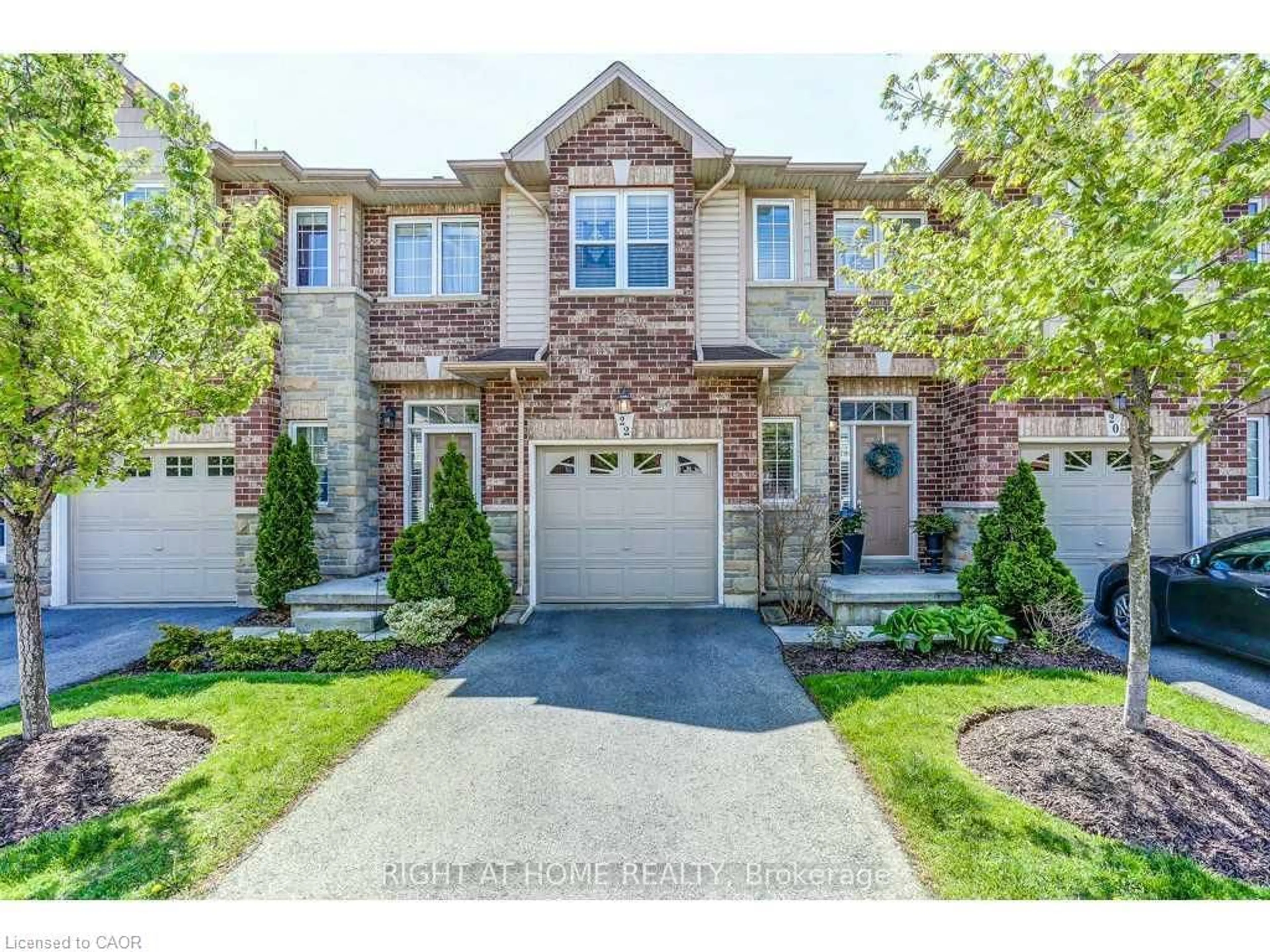 Home with brick exterior material, street for 22 Liddycoat Lane #9, Hamilton Ontario L9G 0A7