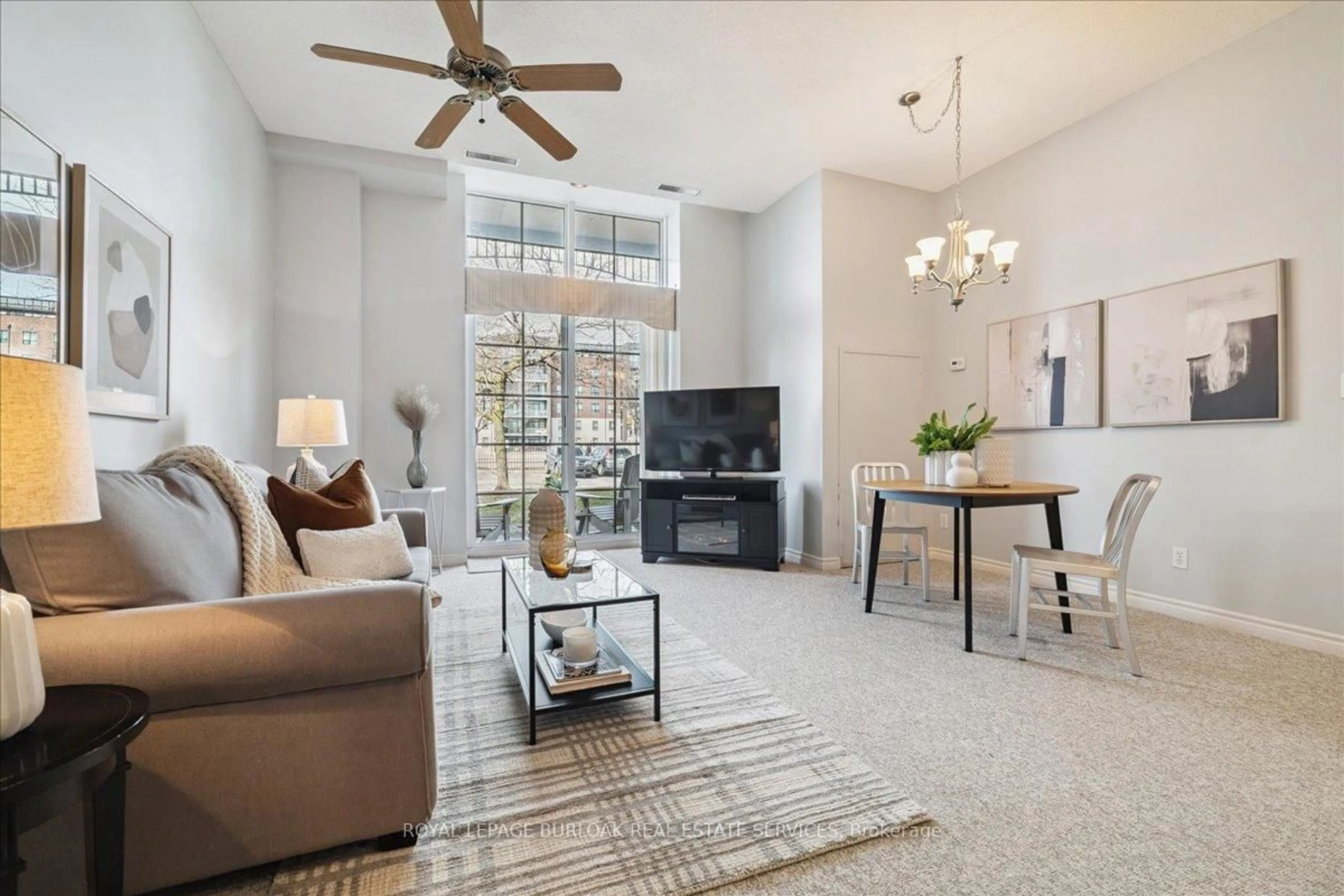 Living room with furniture, ceramic/tile floor for 262 Dundas St #108, Hamilton Ontario L8B 1A9