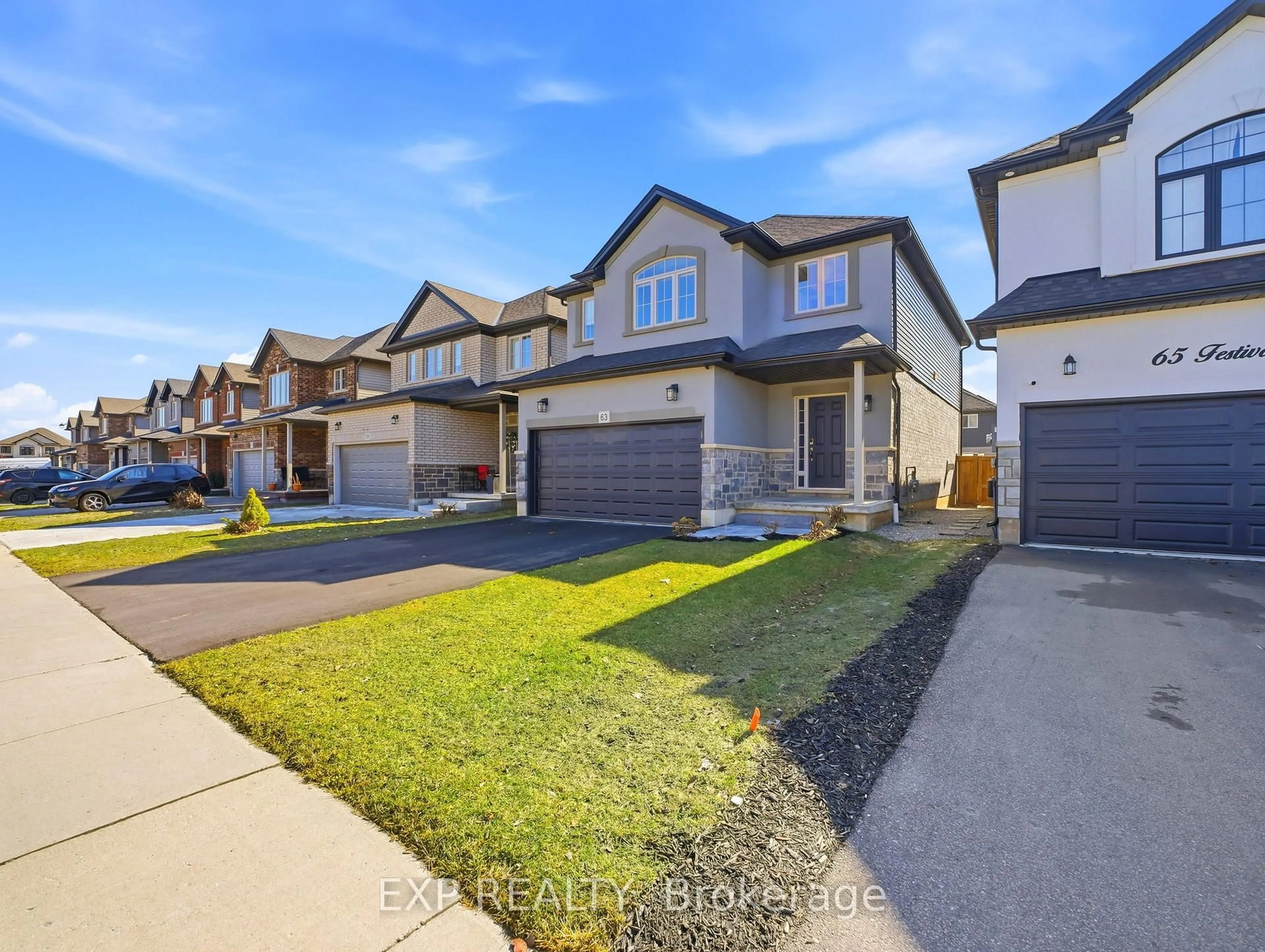 A pic from outside/outdoor area/front of a property/back of a property/a pic from drone, street for 63 Festival Way, Hamilton Ontario L0R 1C0