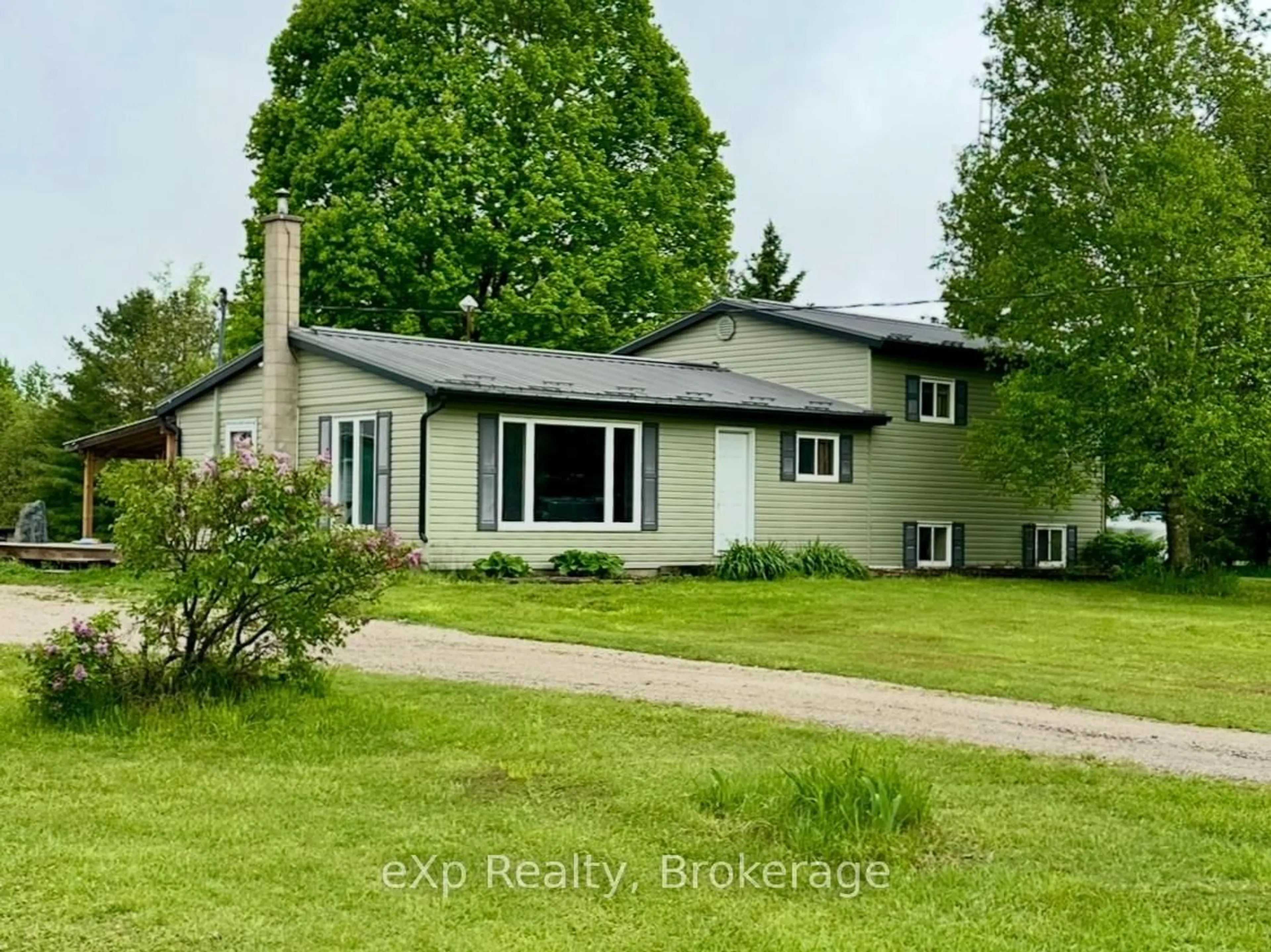 A pic from outside/outdoor area/front of a property/back of a property/a pic from drone, street for 174364 Mulock Rd, West Grey Ontario N0G 1S0