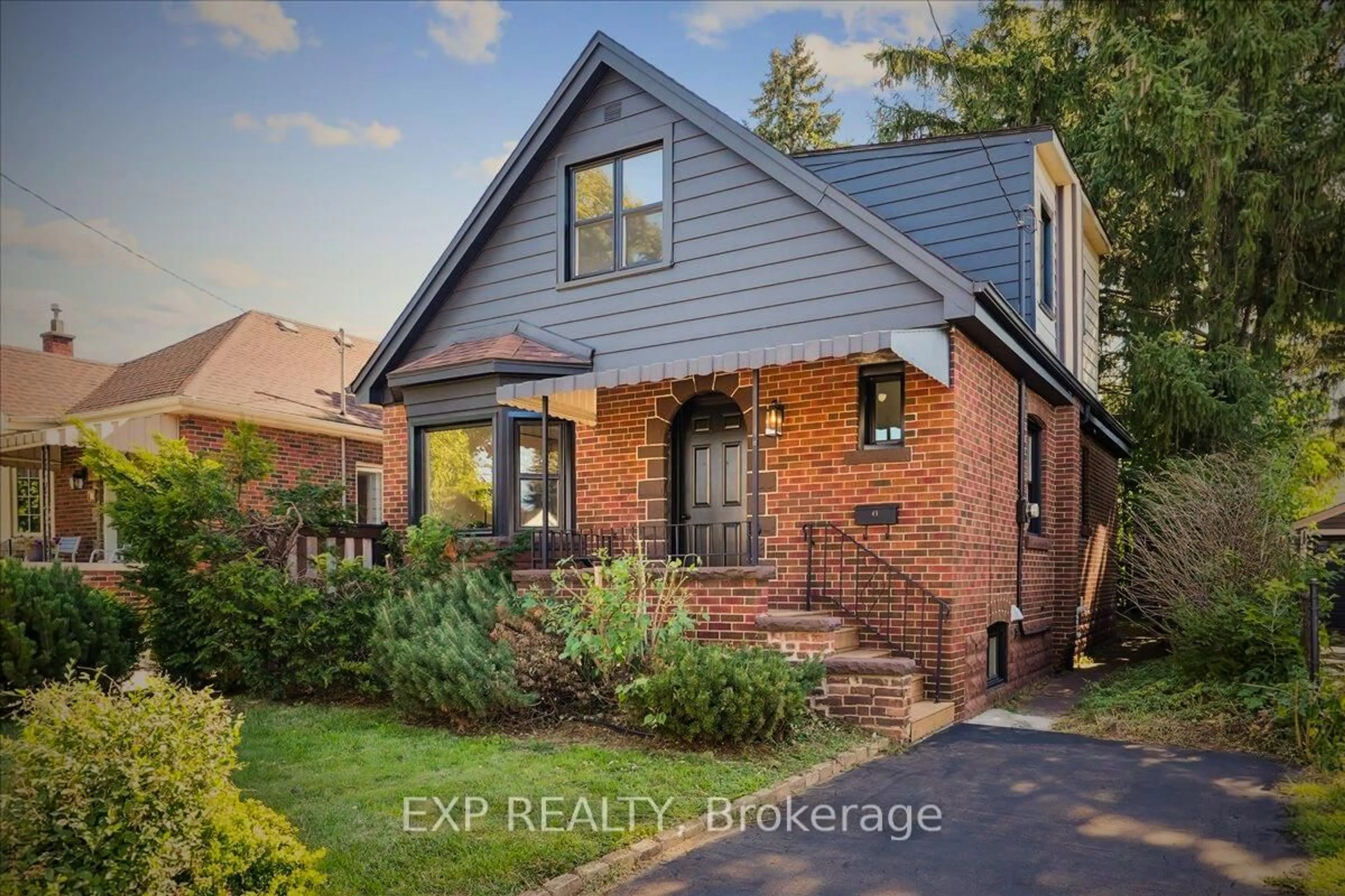 Home with brick exterior material, street for 41 Cameron Ave, Hamilton Ontario L8K 2X1