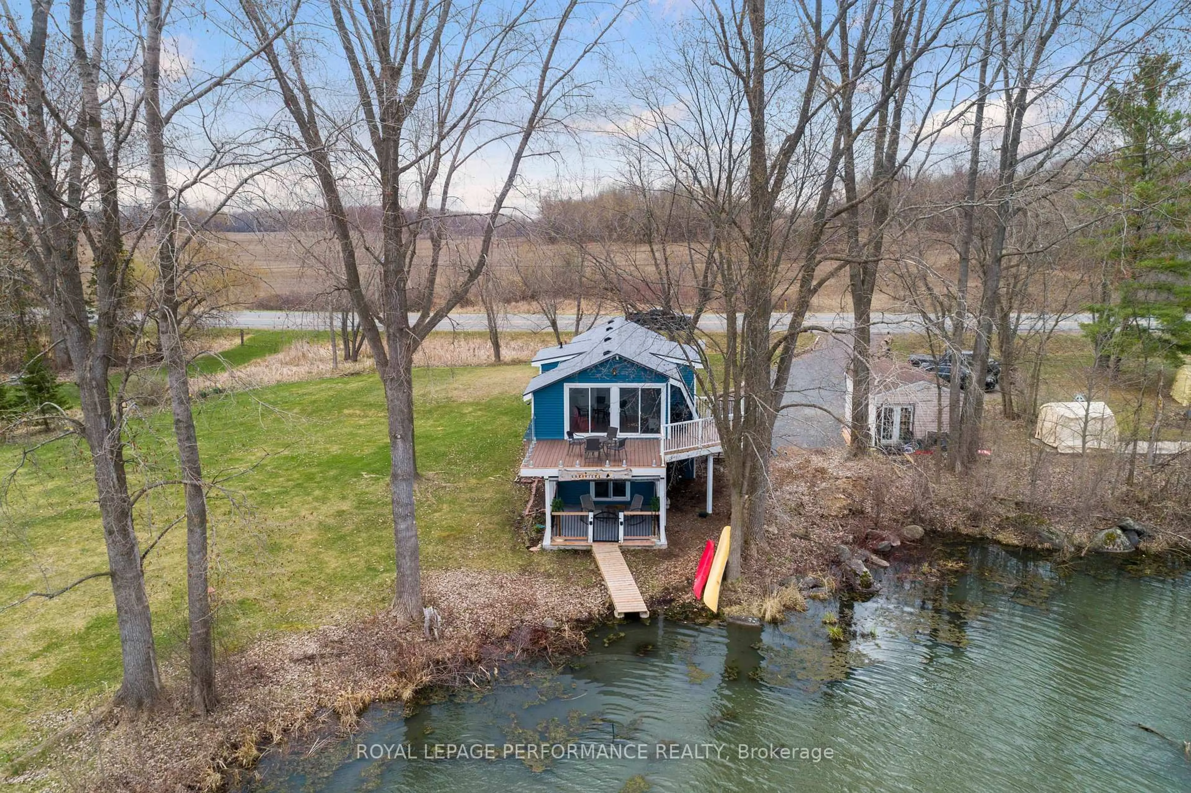 A pic from outside/outdoor area/front of a property/back of a property/a pic from drone, water/lake/river/ocean view for 1930 Sunbury Rd, Inverary Ontario K0H 1X0