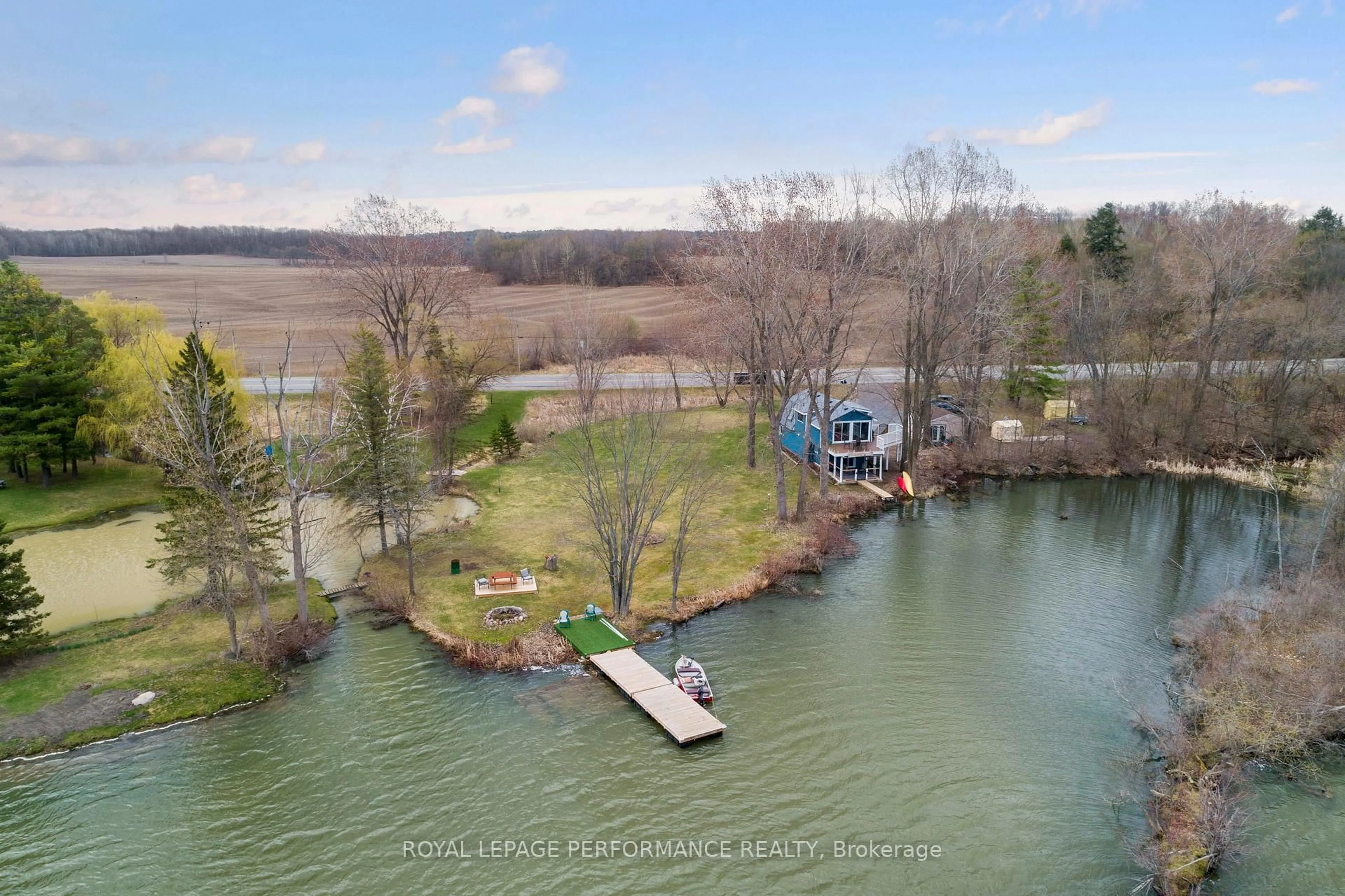 A pic from outside/outdoor area/front of a property/back of a property/a pic from drone, water/lake/river/ocean view for 1930 Sunbury Rd, Inverary Ontario K0H 1X0