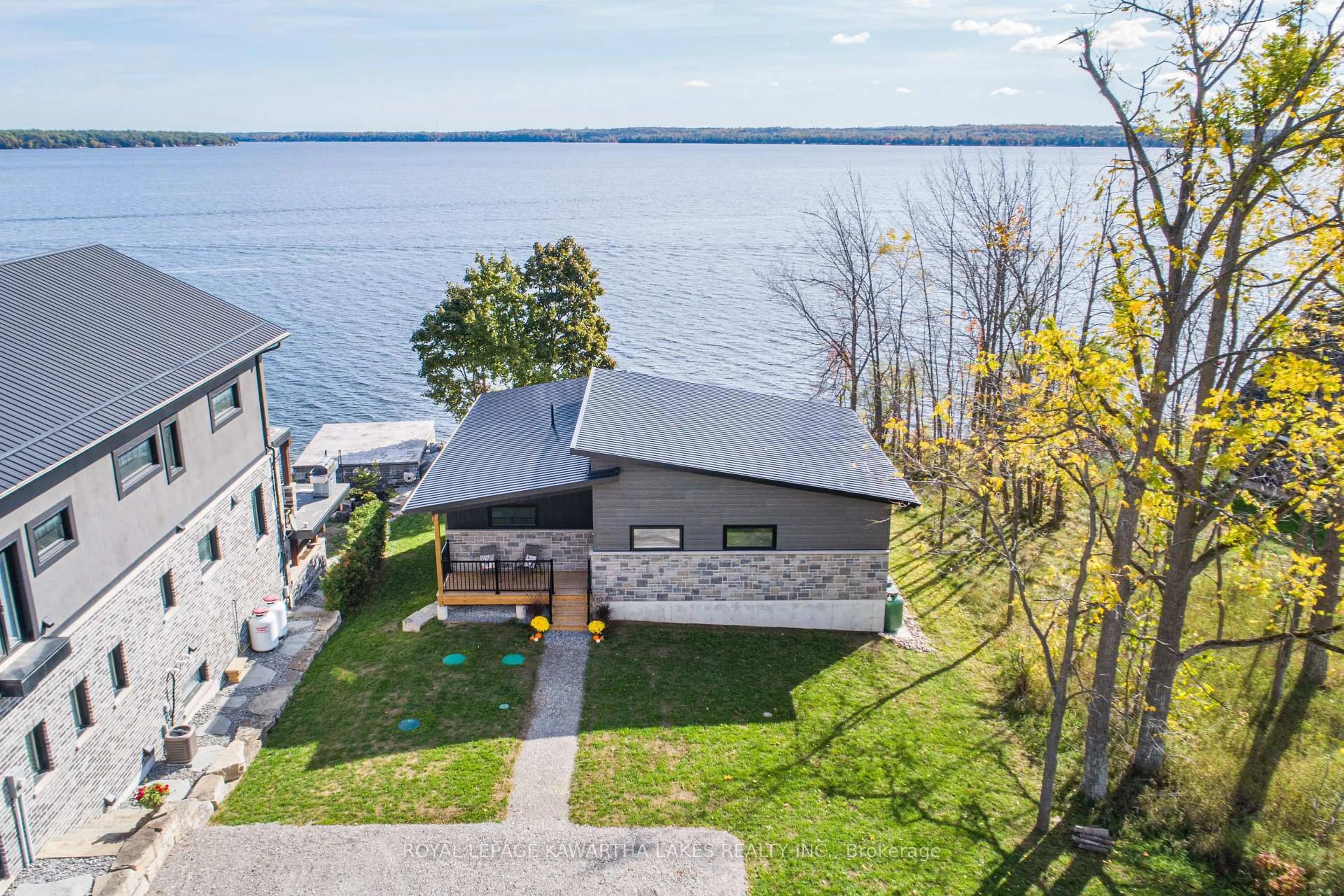 A pic from outside/outdoor area/front of a property/back of a property/a pic from drone, water/lake/river/ocean view for 532 Long Beach Rd, Kawartha Lakes Ontario K0M 1G0