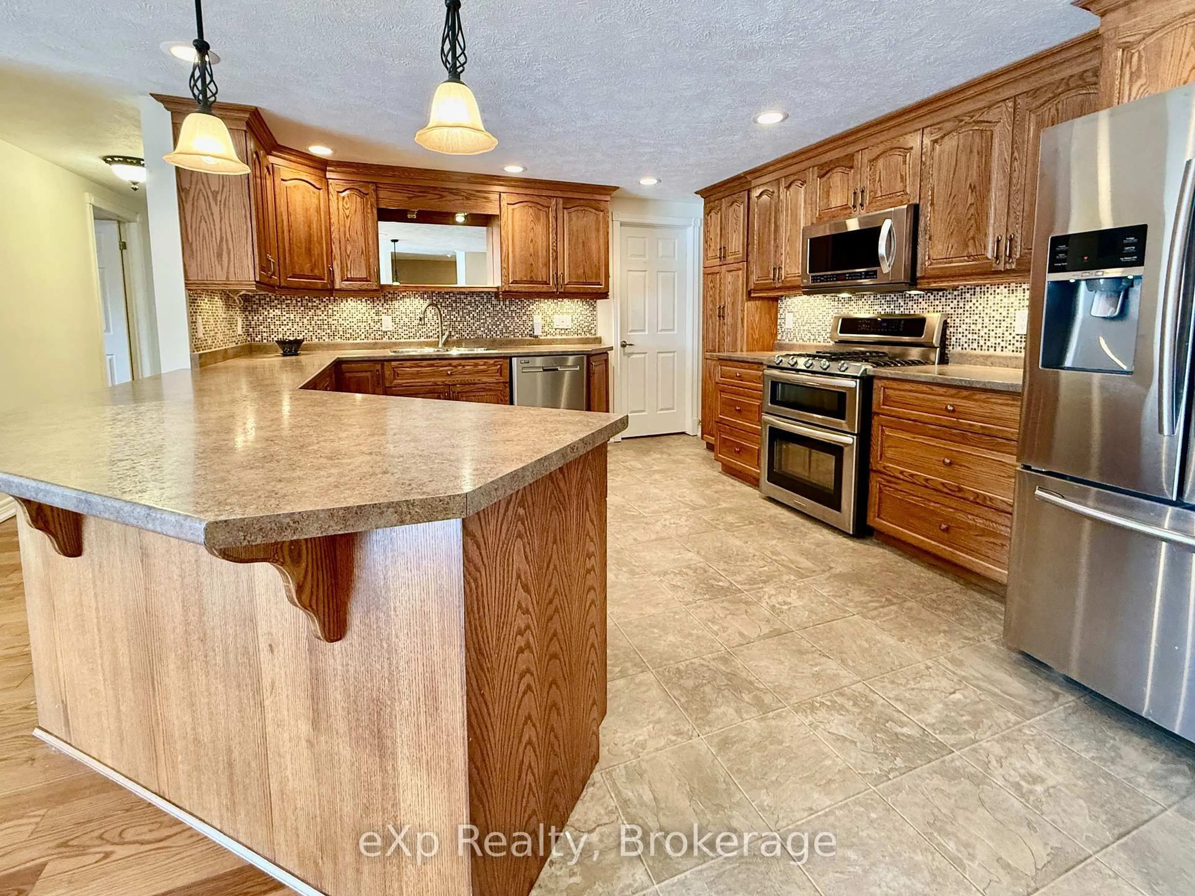 Open concept kitchen, ceramic/tile floor for 125 William St #203, Brockton Ontario N0G 2V0