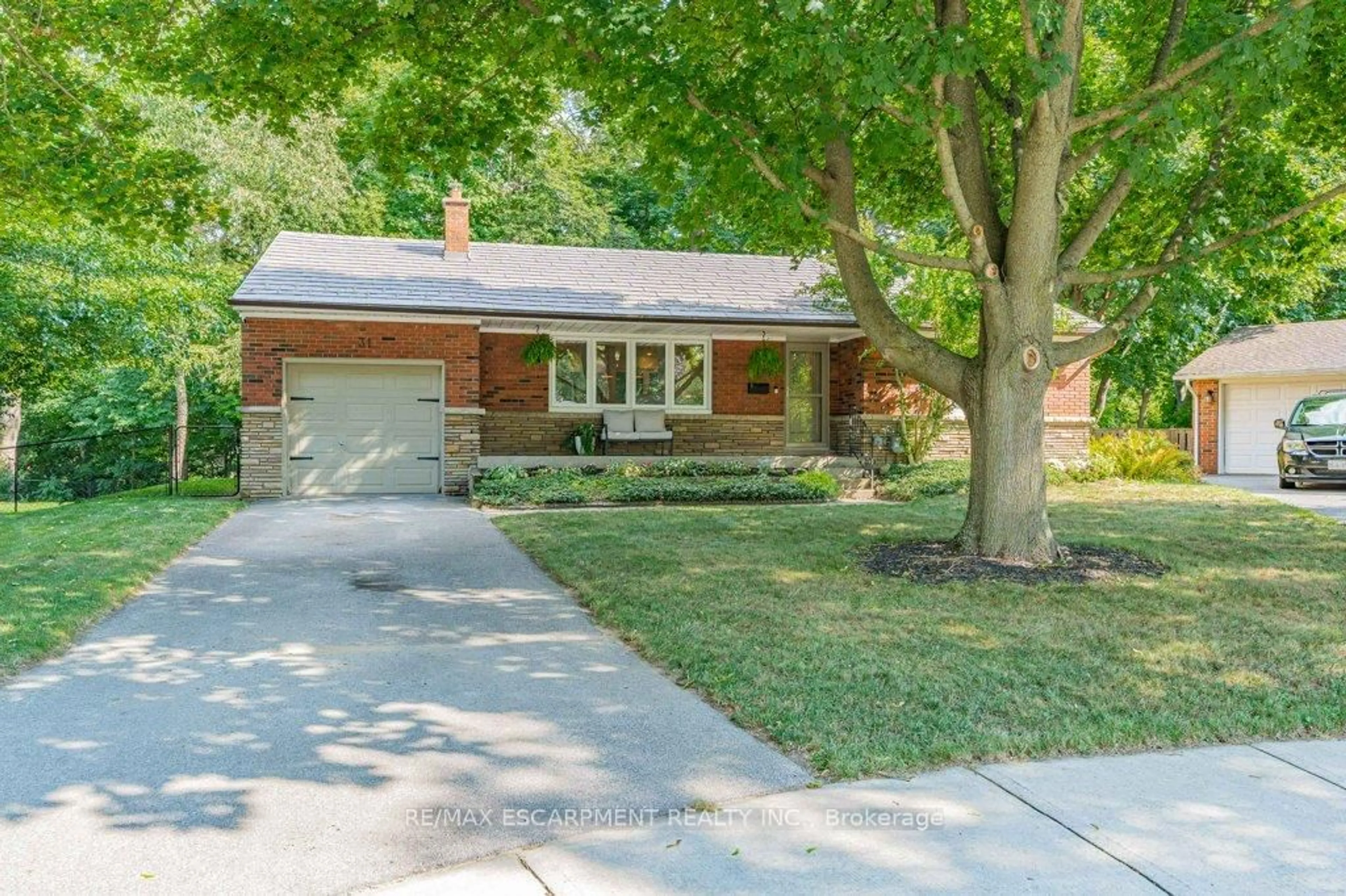 Home with brick exterior material, street for 31 Dunning Crt, Hamilton Ontario L9H 4K8