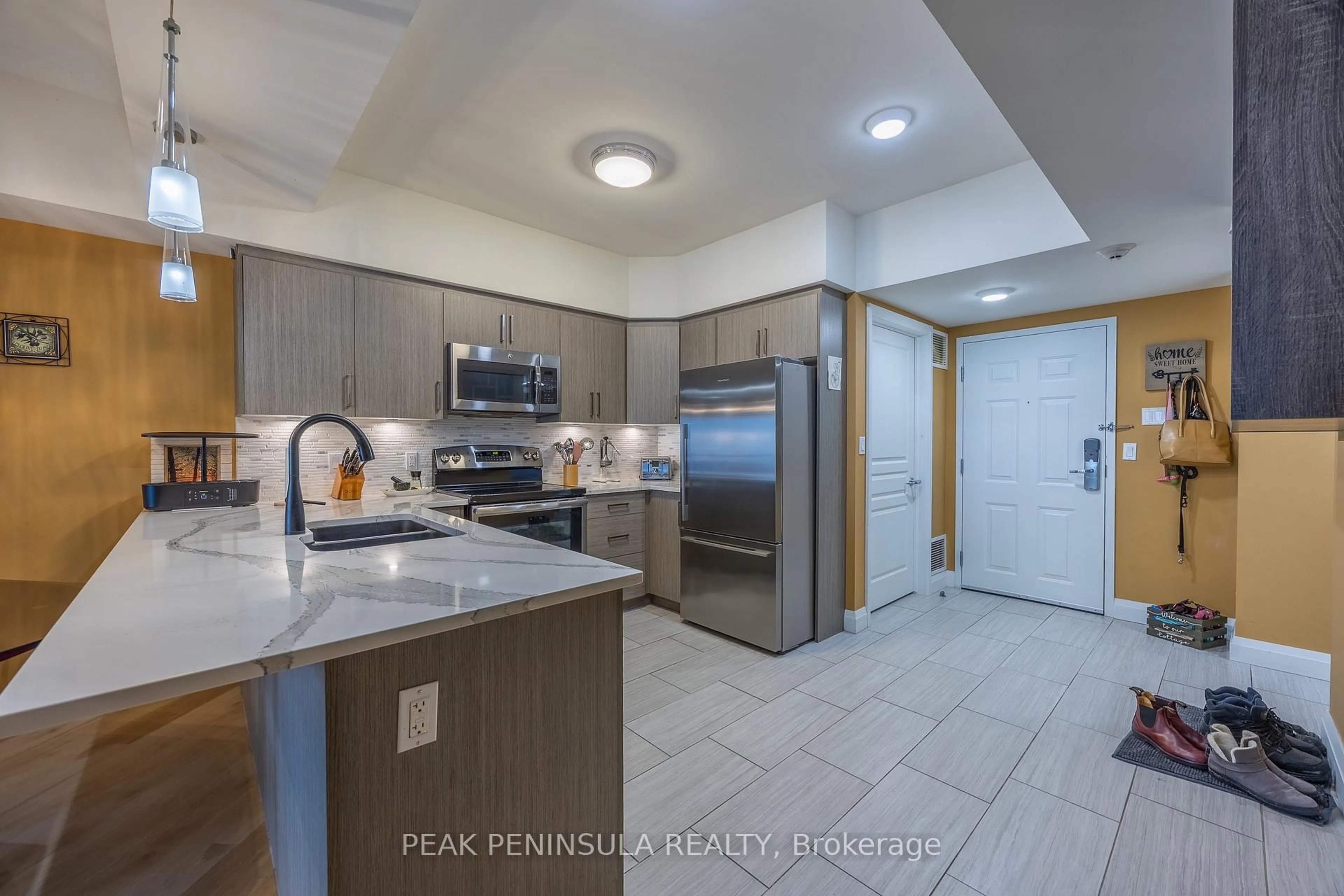 Open concept kitchen, ceramic/tile floor for 12 Erie Blvd #203, Norfolk Ontario N0E 1M0