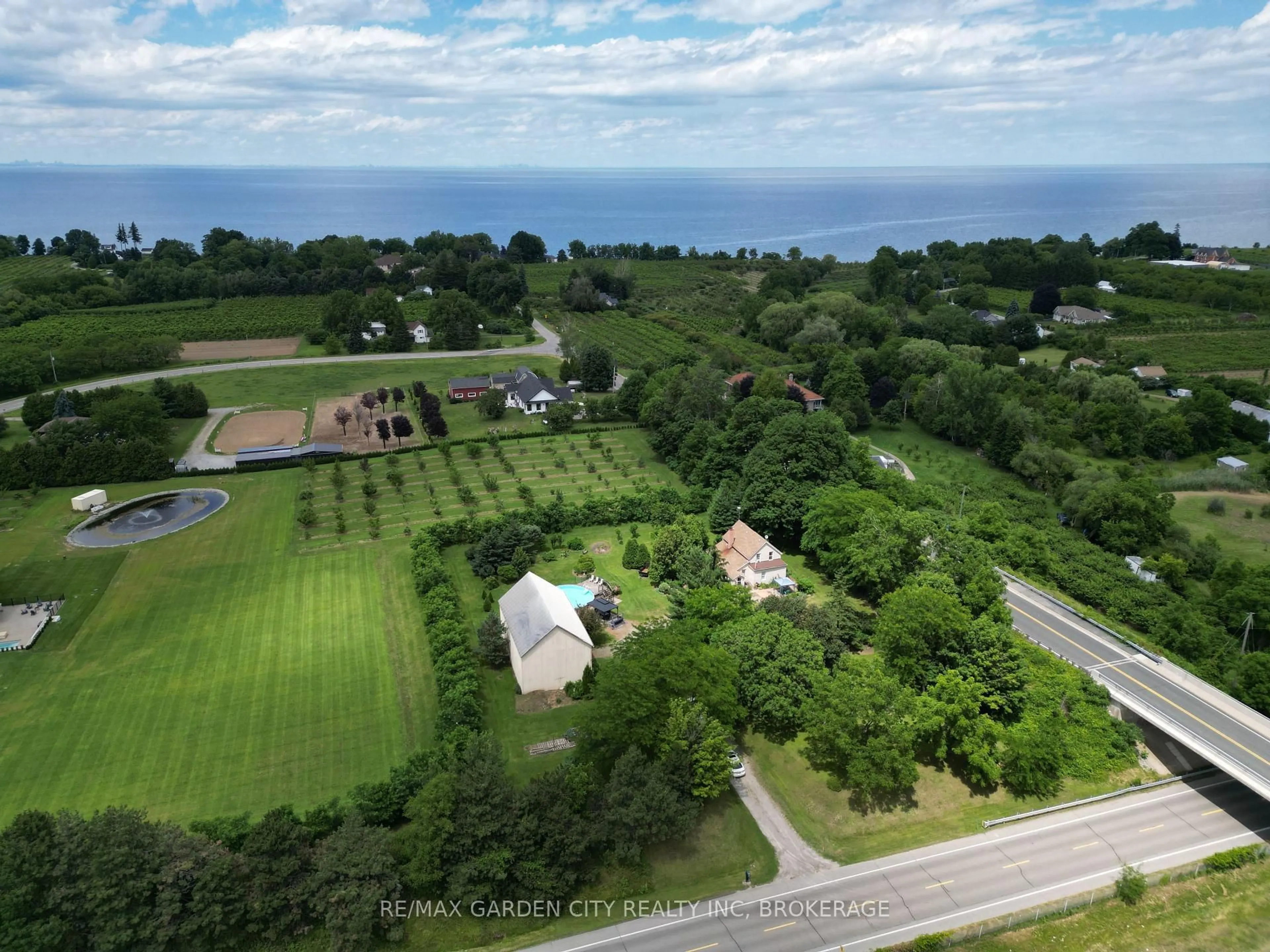 A pic from outside/outdoor area/front of a property/back of a property/a pic from drone, water/lake/river/ocean view for 5400 North Service Rd, Lincoln Ontario L0R 1B3
