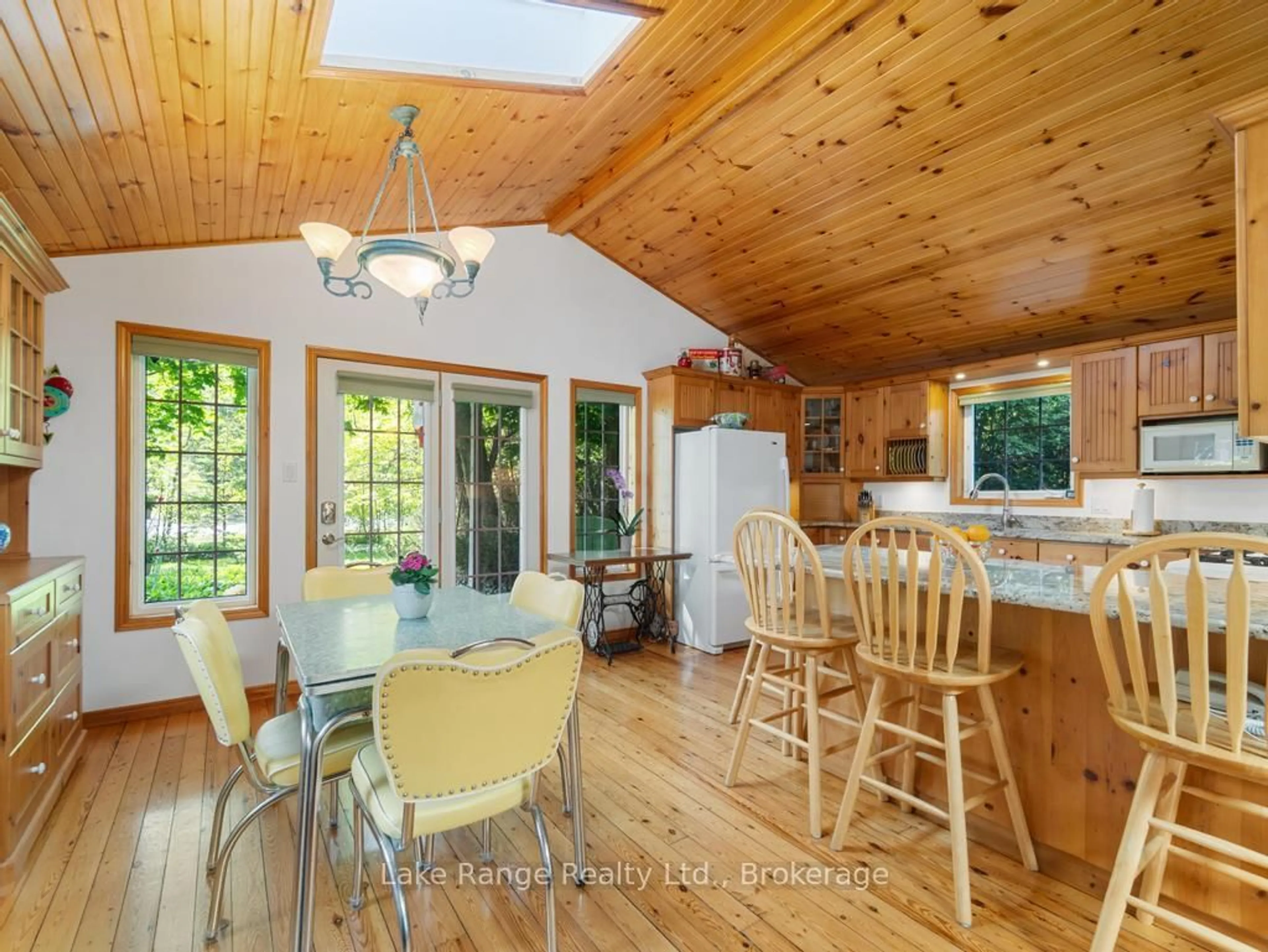 Open concept kitchen, wood/laminate floor for 269 Huron Rd, Huron-Kinloss Ontario N2Z 2X3