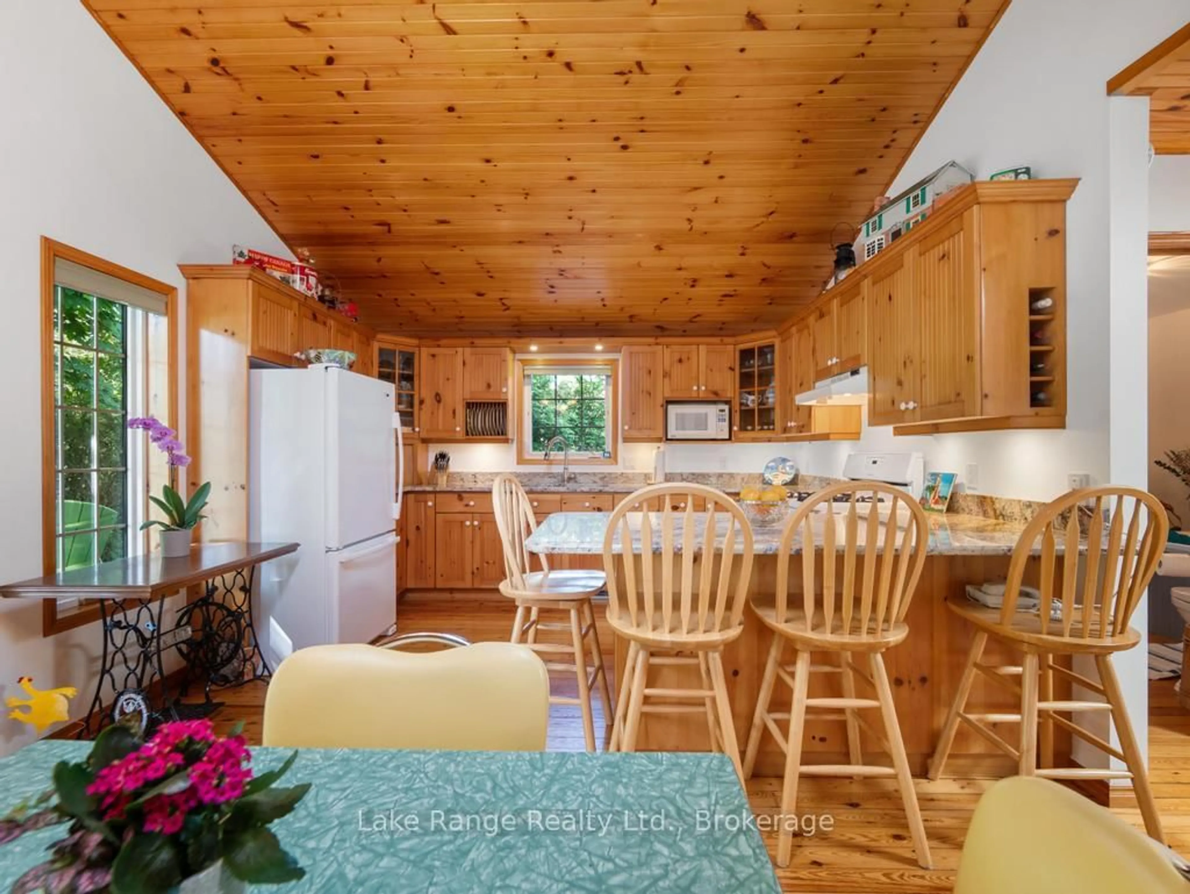 Open concept kitchen, wood/laminate floor for 269 Huron Rd, Huron-Kinloss Ontario N2Z 2X3