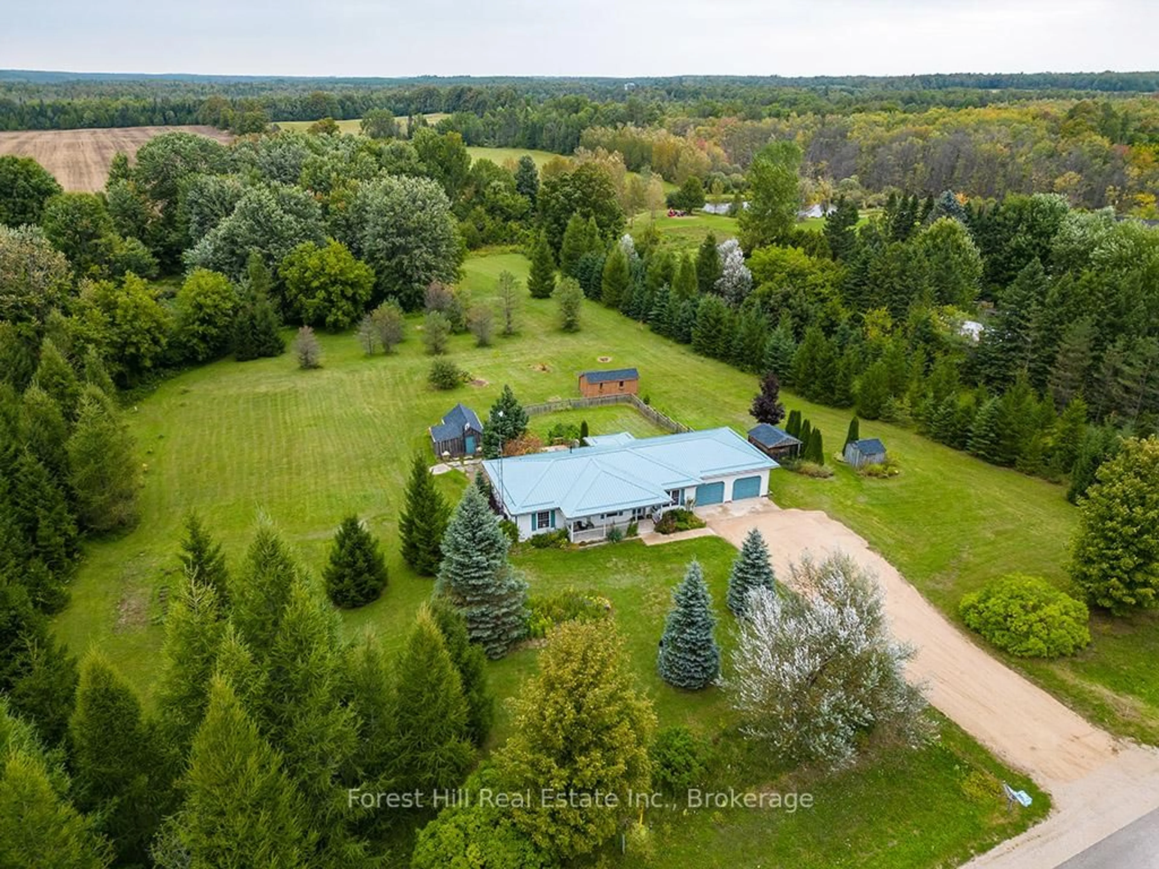 A pic from outside/outdoor area/front of a property/back of a property/a pic from drone, forest/trees view for 504097 Grey Road 12, West Grey Ontario N0C 1H0
