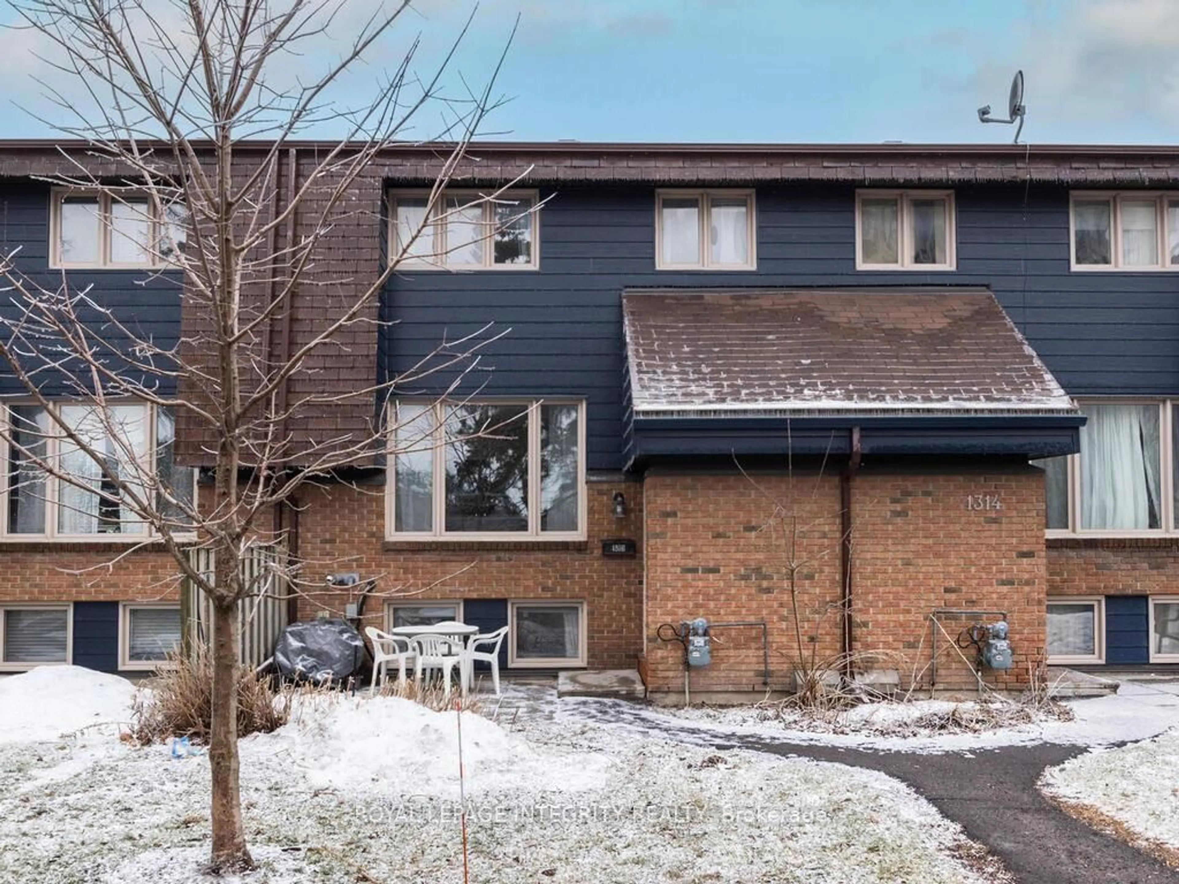 Home with brick exterior material, street for 1316 Greenbank Rd #54, Nepean Ontario K2H 8X6