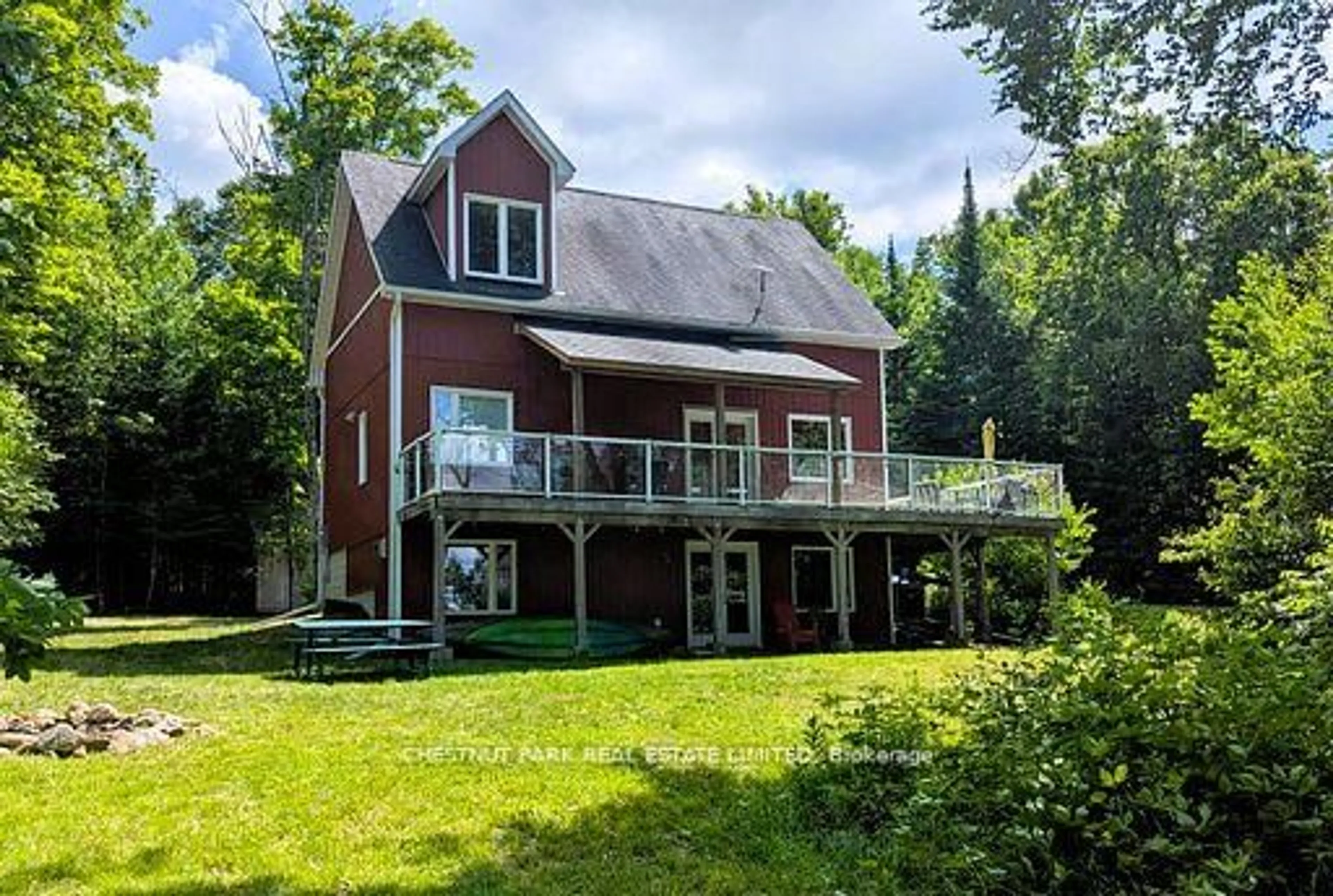 A pic from outside/outdoor area/front of a property/back of a property/a pic from drone, water/lake/river/ocean view for 1038 Stonehenge Lane, Highlands East Ontario K0L 1M0