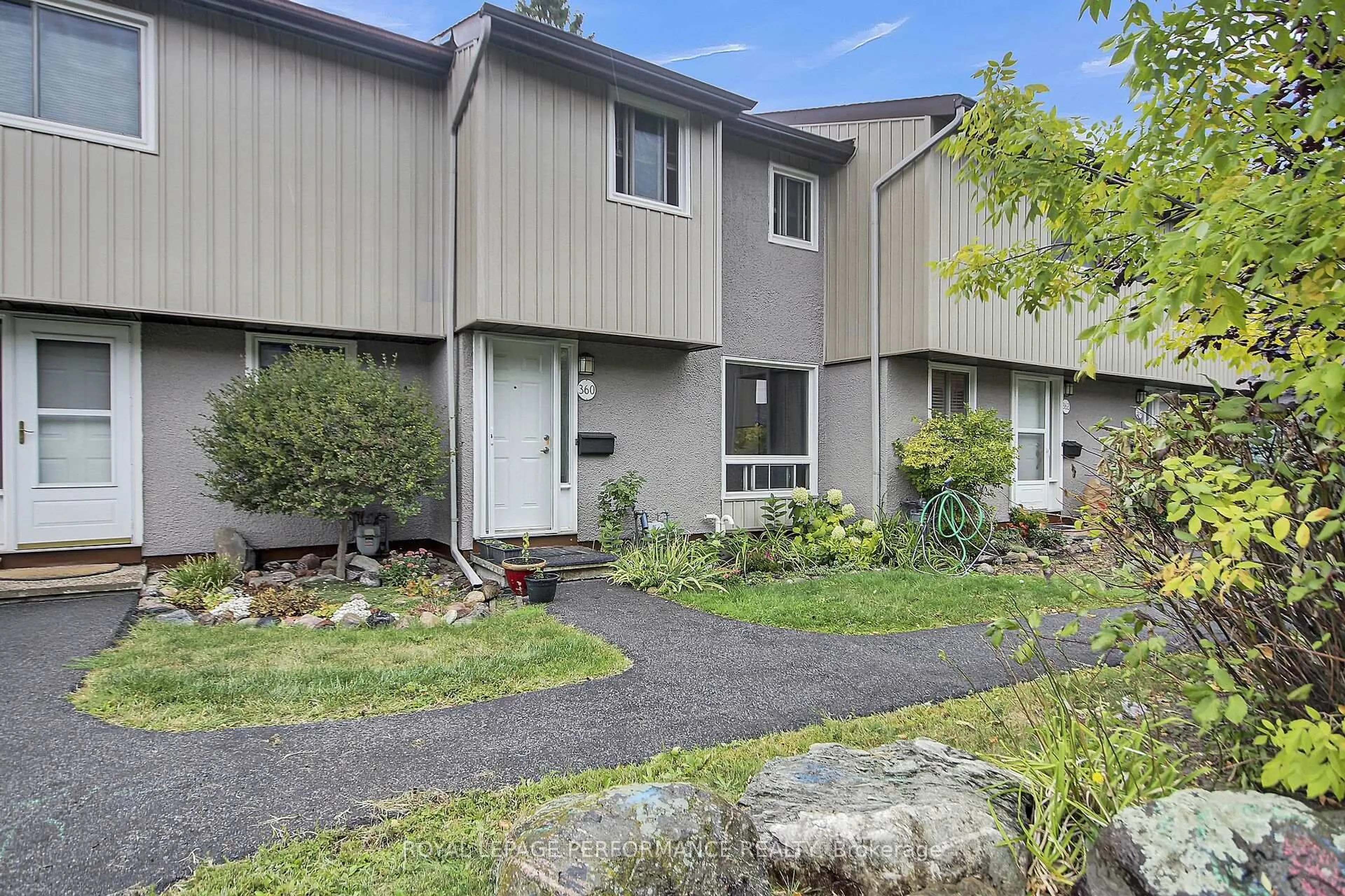 Home with vinyl exterior material, street for 360 Woodfield Dr, Ottawa Ontario K2G 3W9